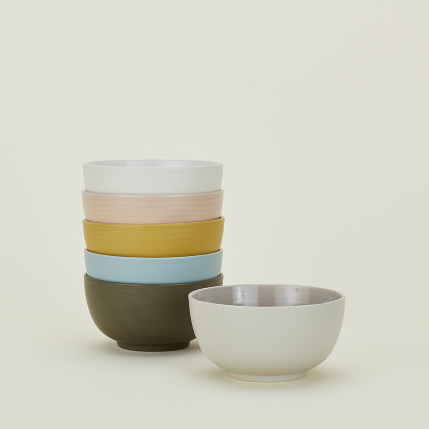 Stack of Essential Large Bowls in various colors.