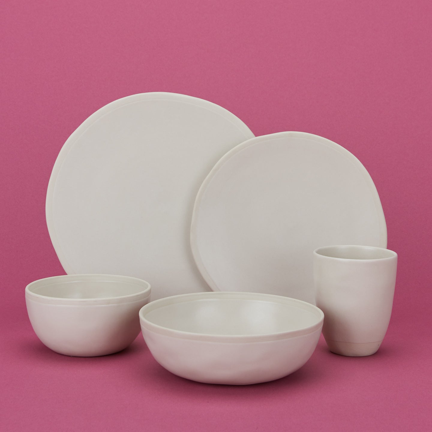 Group of Atelier Dinnerware including small bowl, medium bowl, salad plate, dinner plate and mug.
