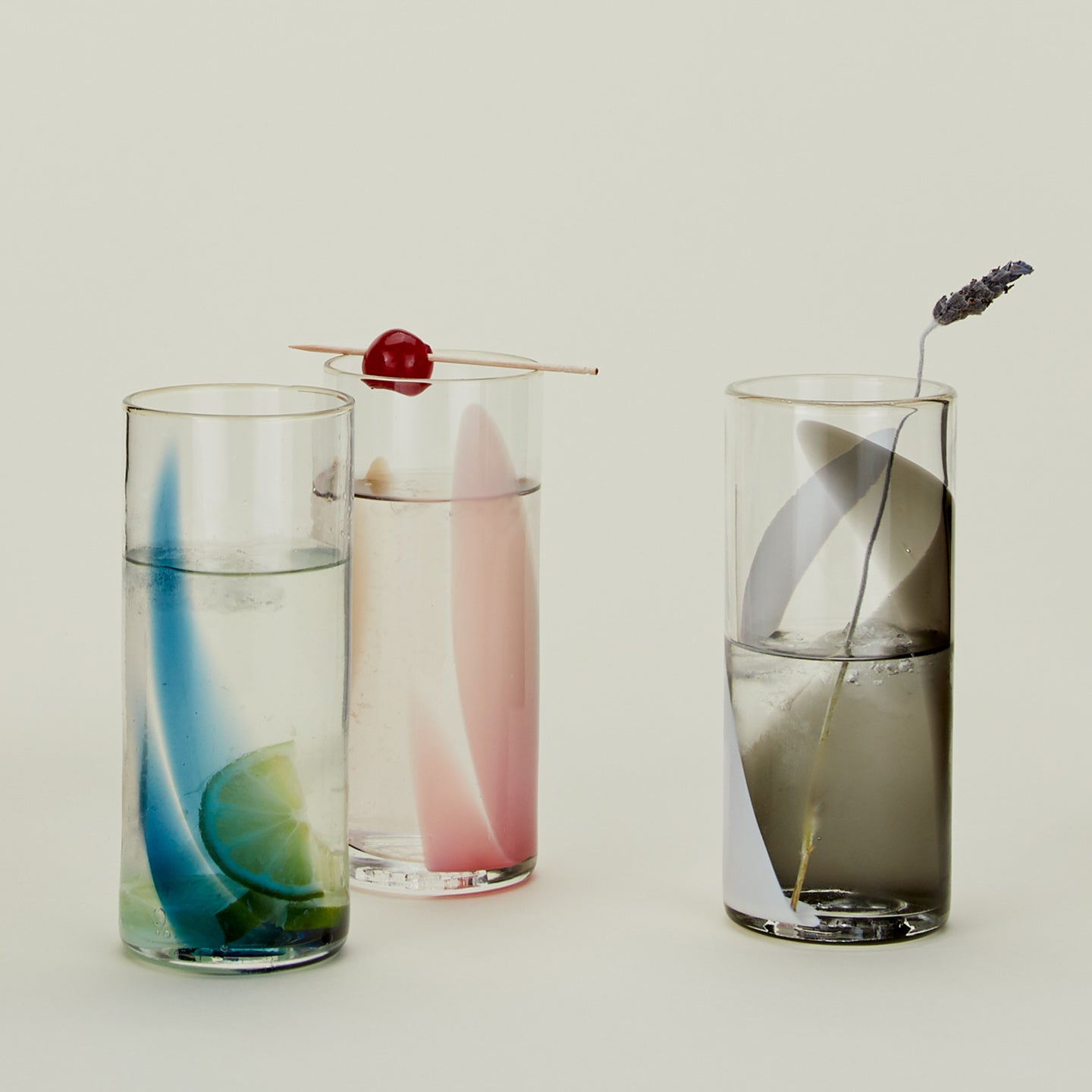 Group of Blown Glass Highballs in various colors.