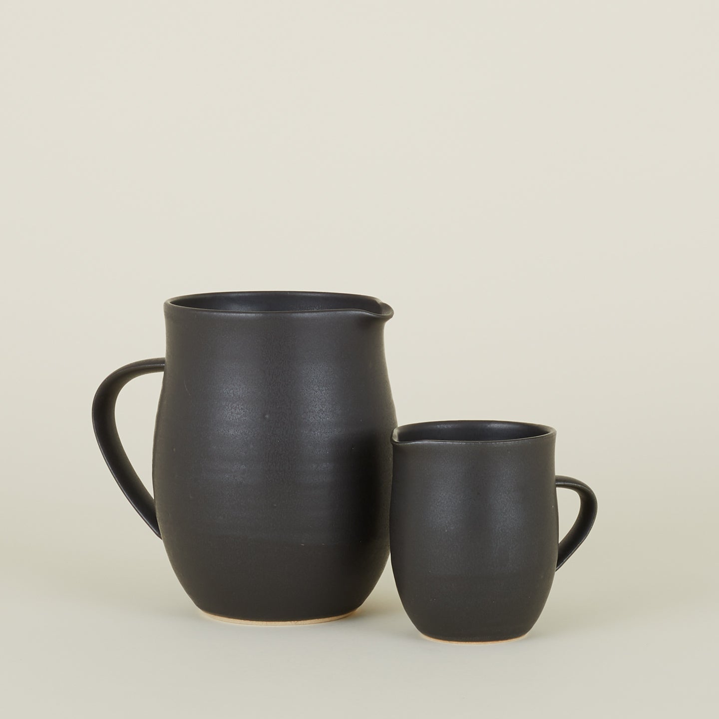 Stoneware Creamer and Stoneware Pitcher in Black.