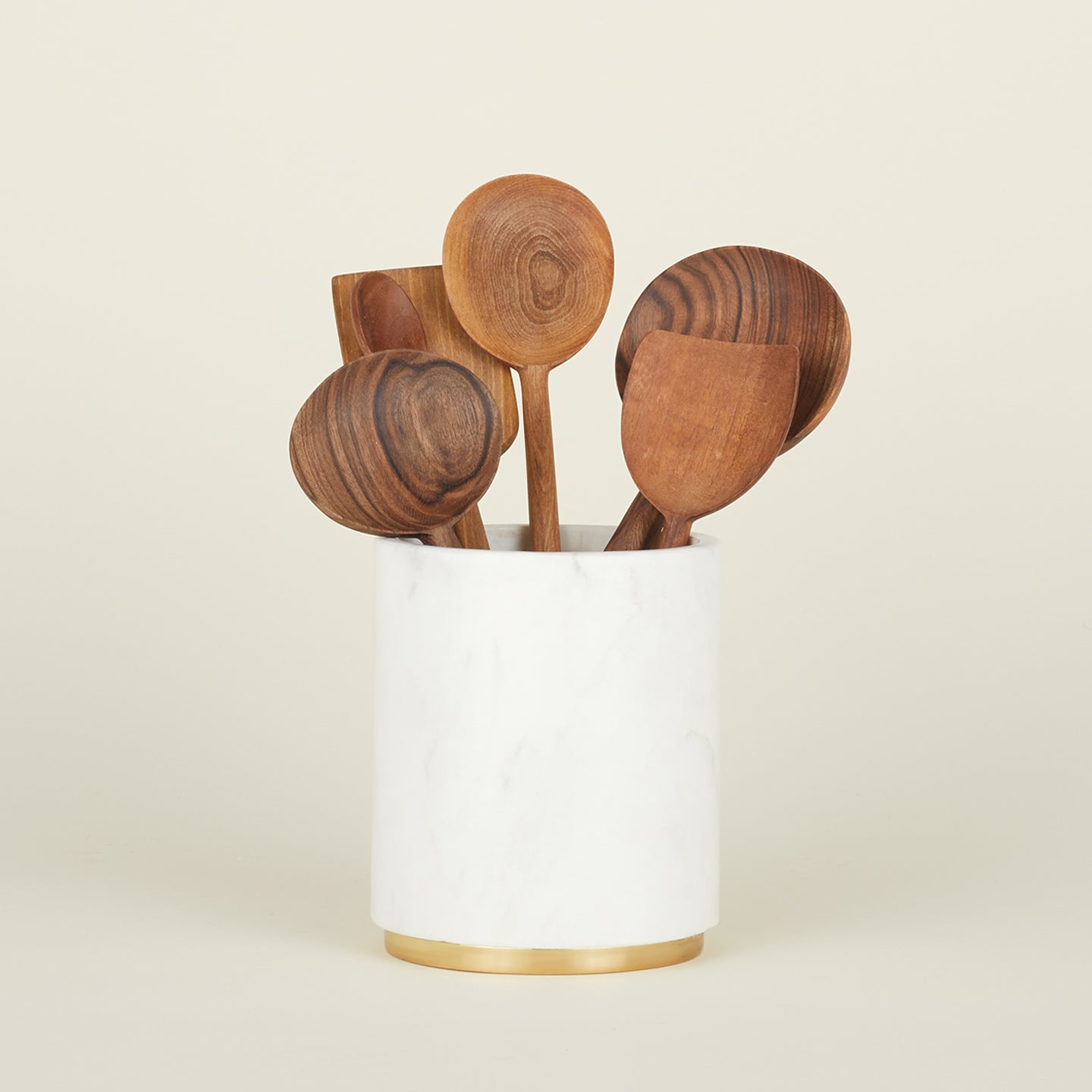 Simple Marble Utility Canister holding a group of wood spoons.