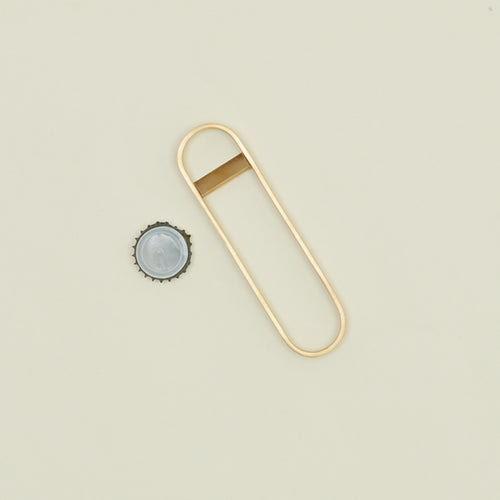 Fein Bottle Opener in Brass with bottlecap.