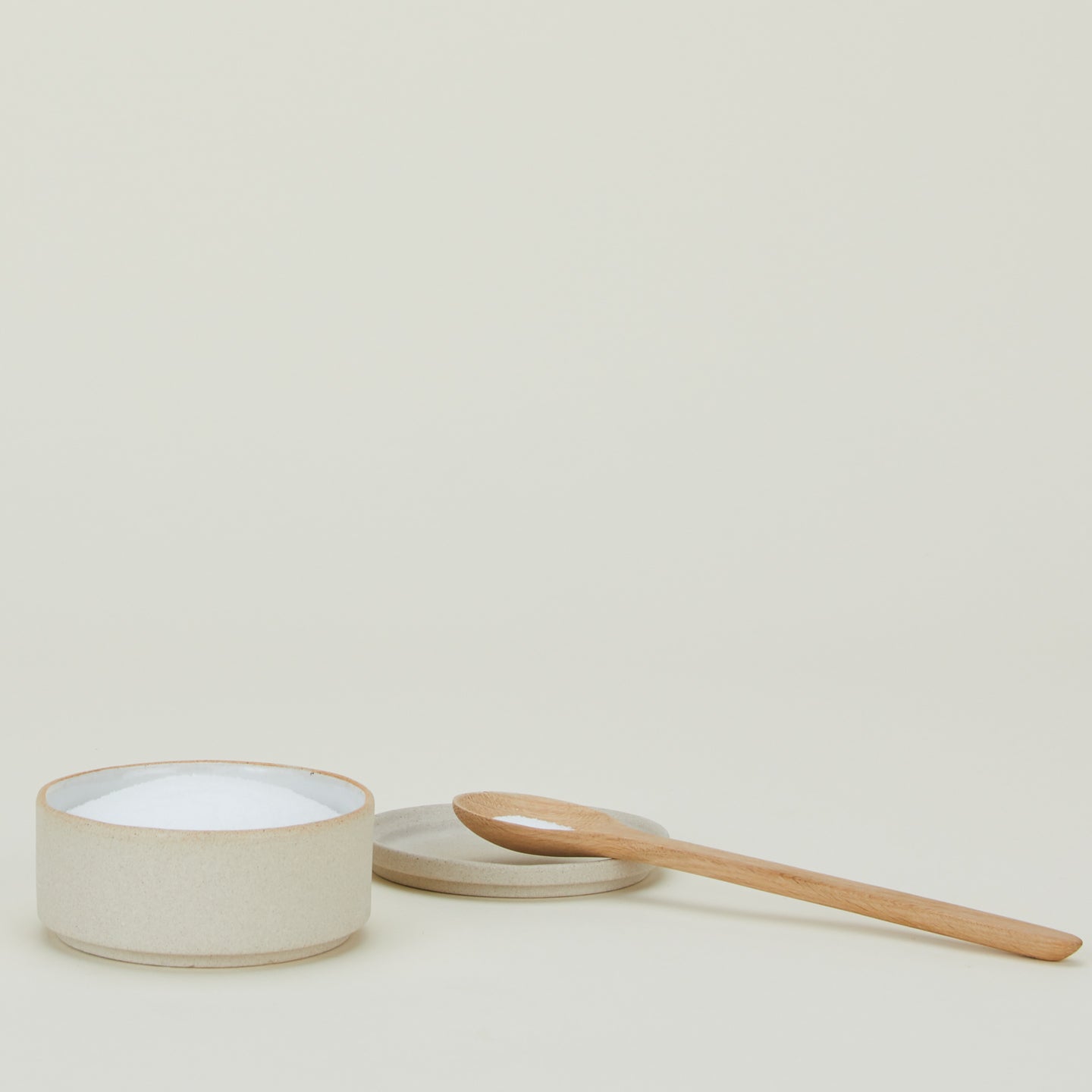 Minimal Salt Cellar with wooden spoon.