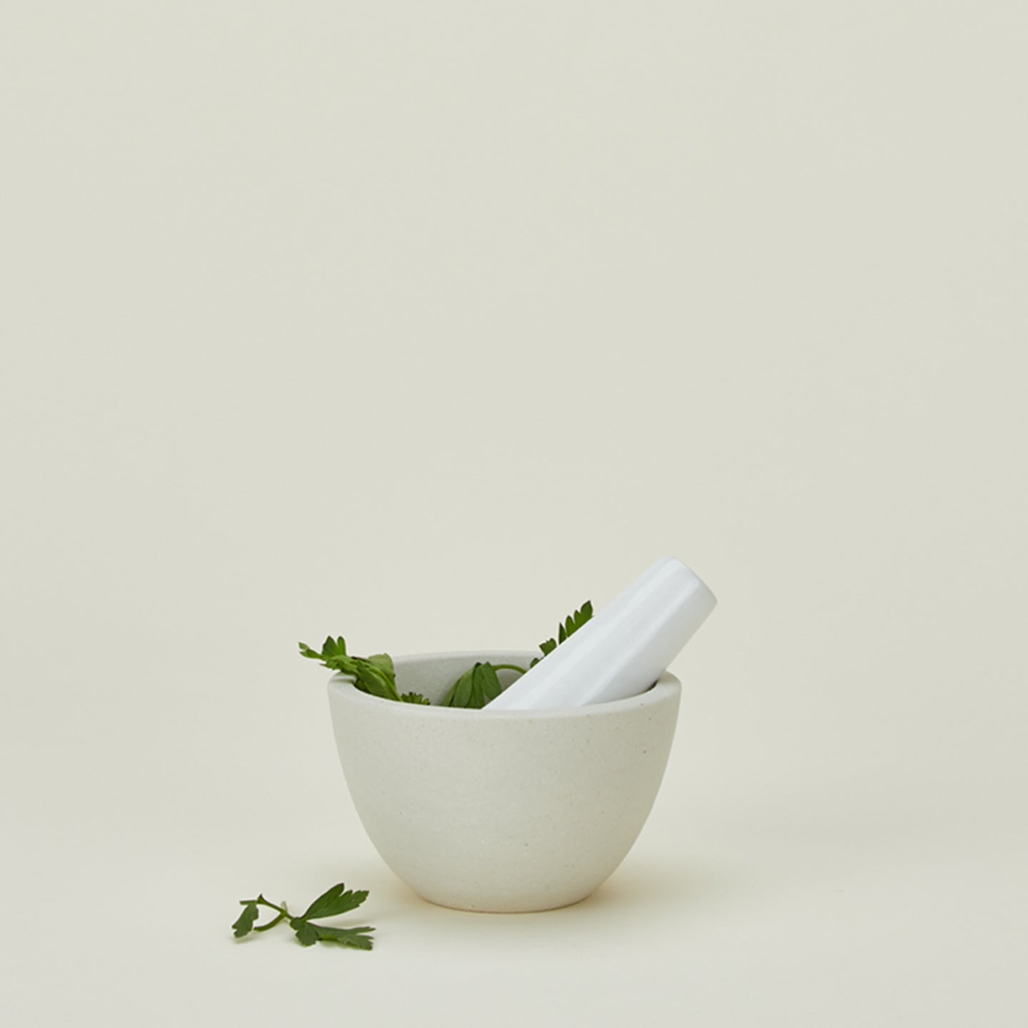 Atelier Trema mortar and pestle with parsley