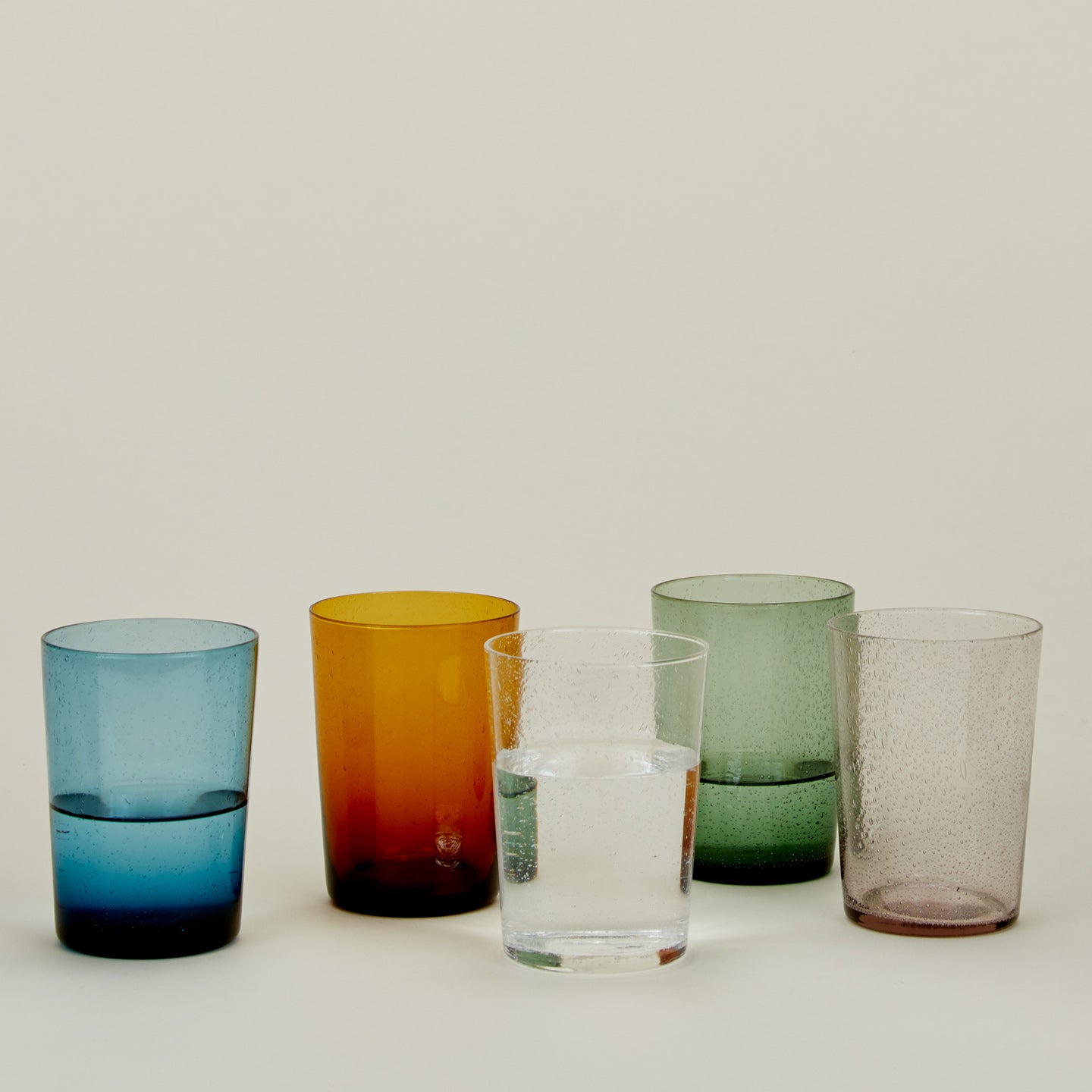 Group of Glass Tumblers in various colors.