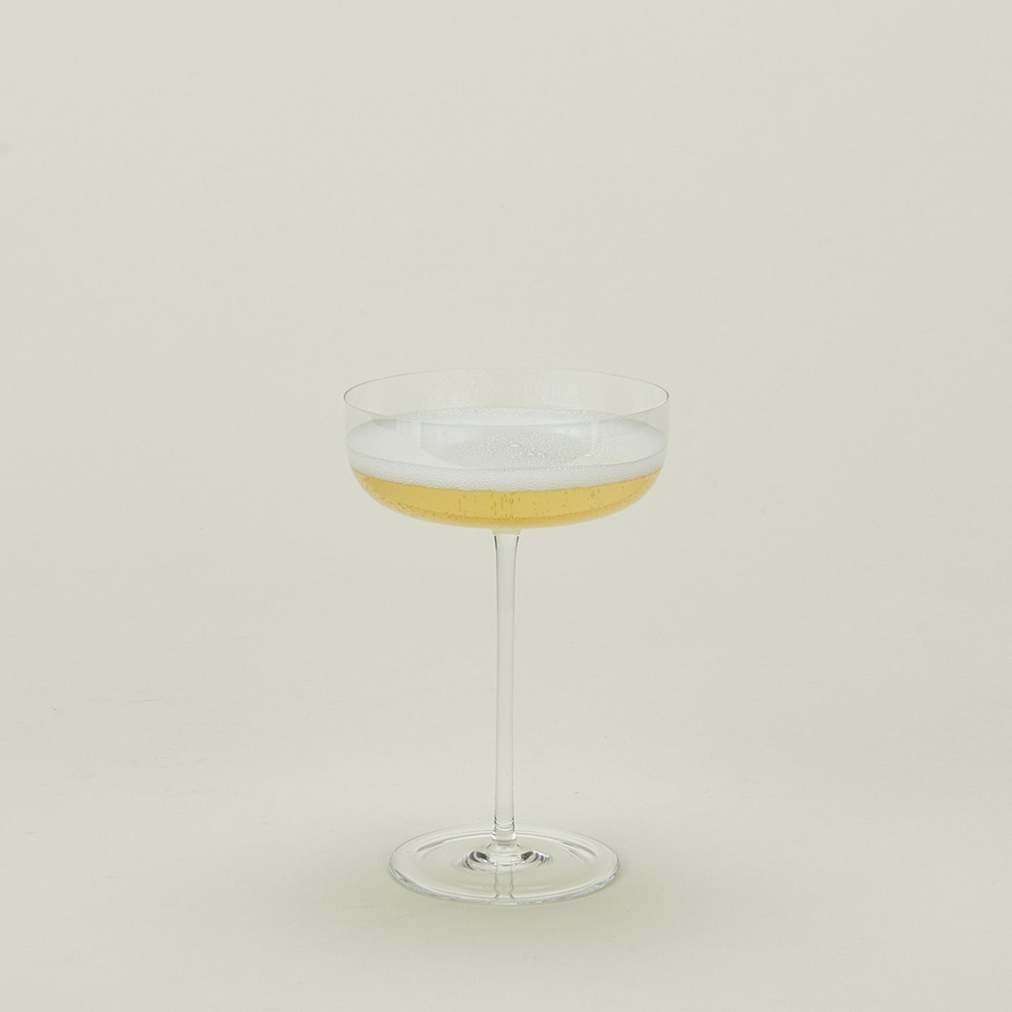 Crystalline champagne coupe with champagne