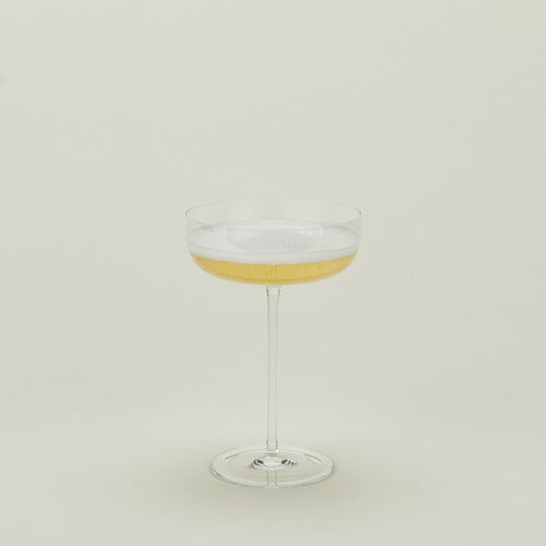 Crystalline champagne coupe with champagne