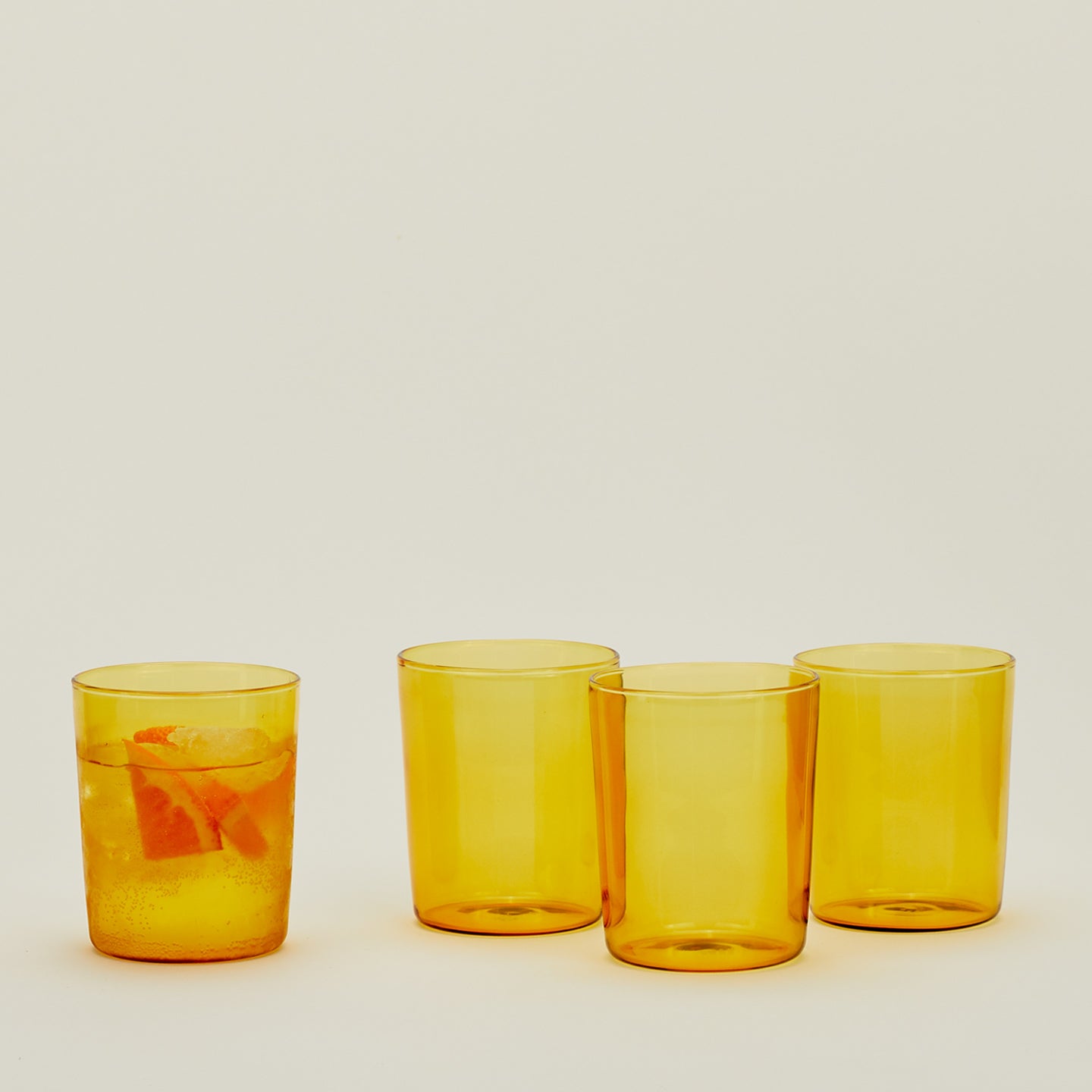 Four Medium Essential Glasses in Amber.