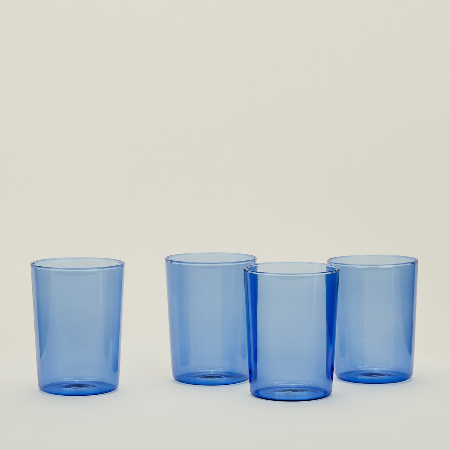 Four Large Essential Glasses in Blue.