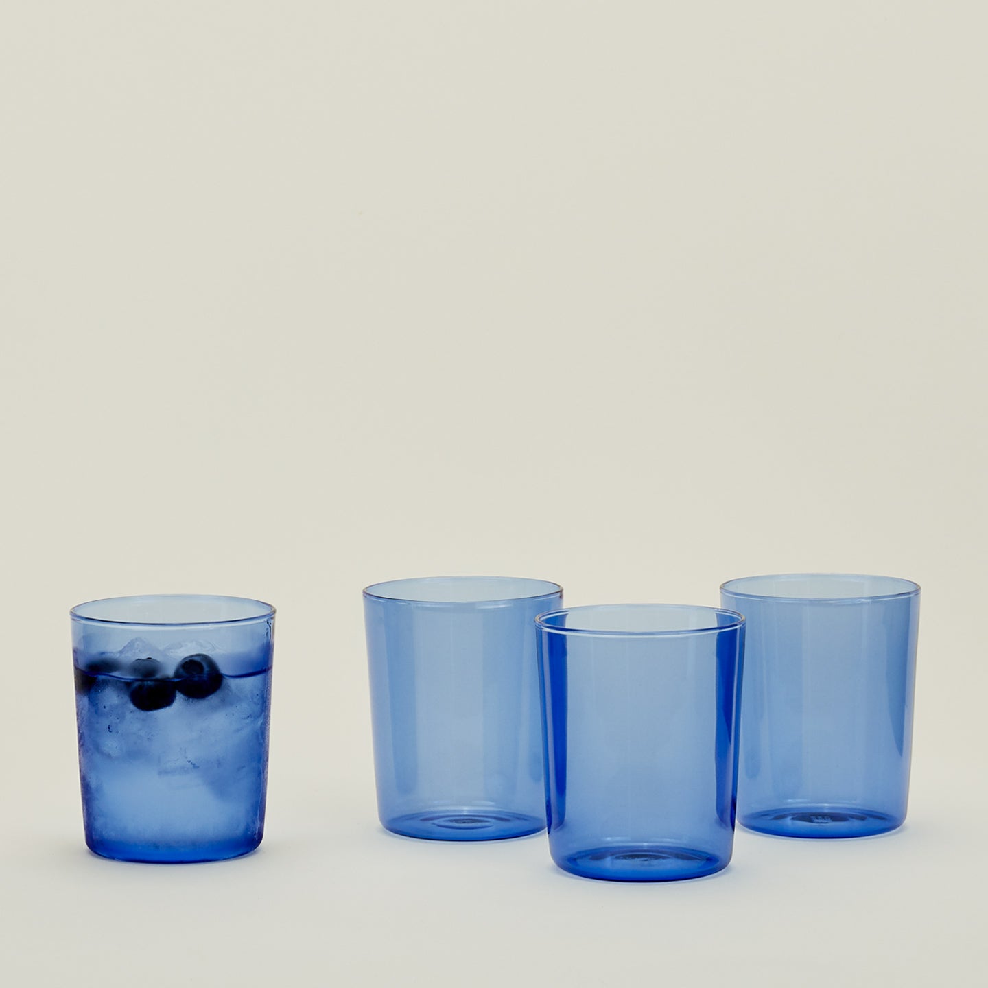 Four Medium Essential Glasses in Blue.