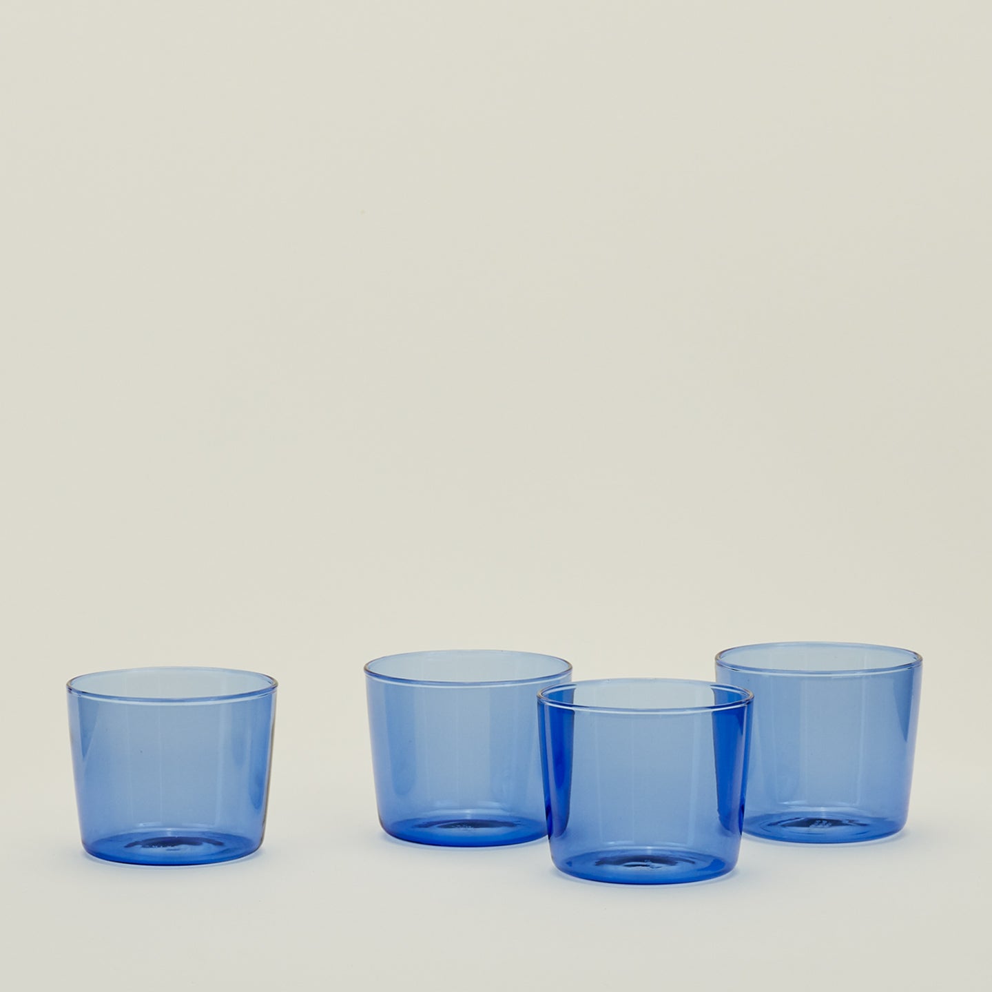 Four Small Essential Glasses in Blue.