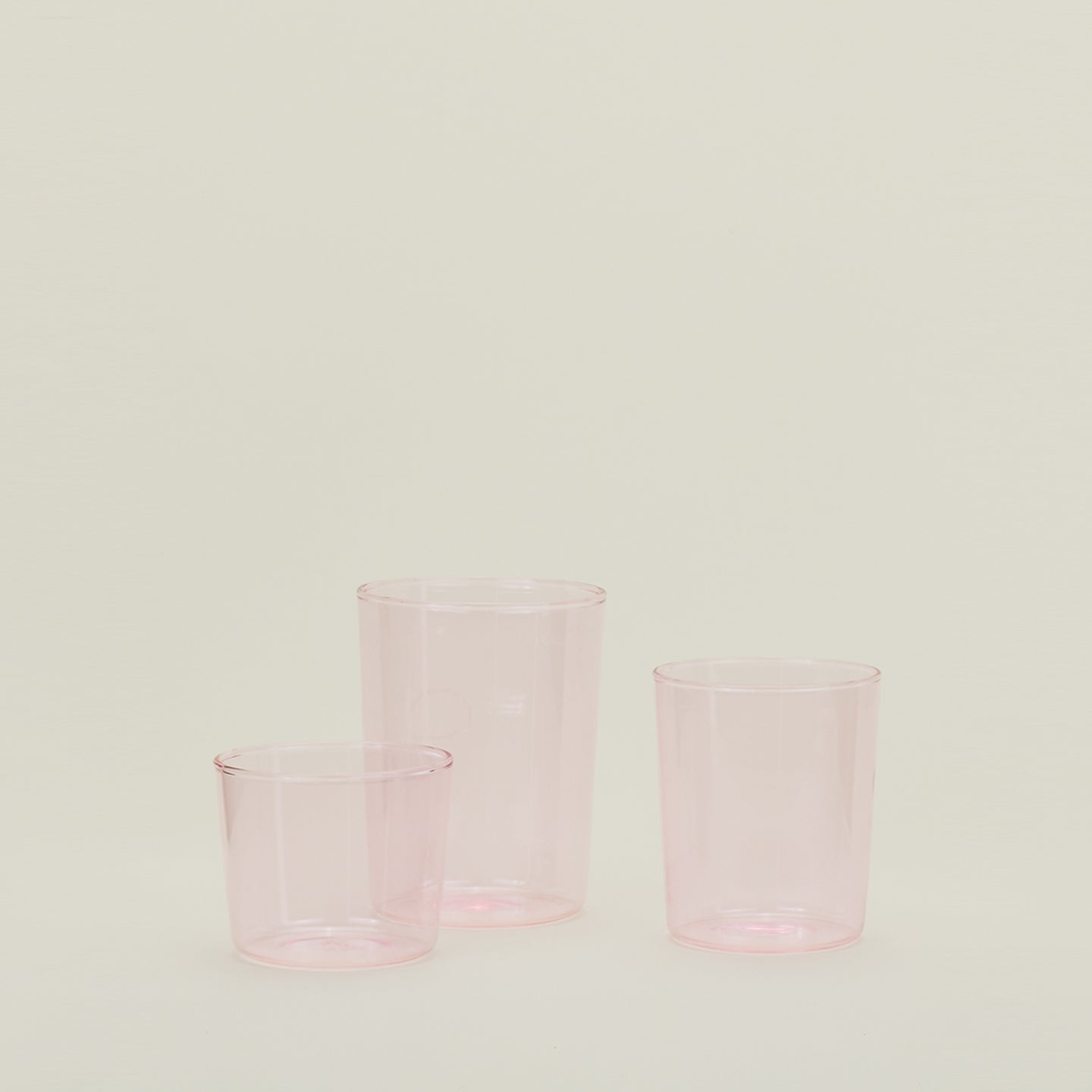 Group of three Essential Glasses in Blush in Small, Medium and Large sizes.