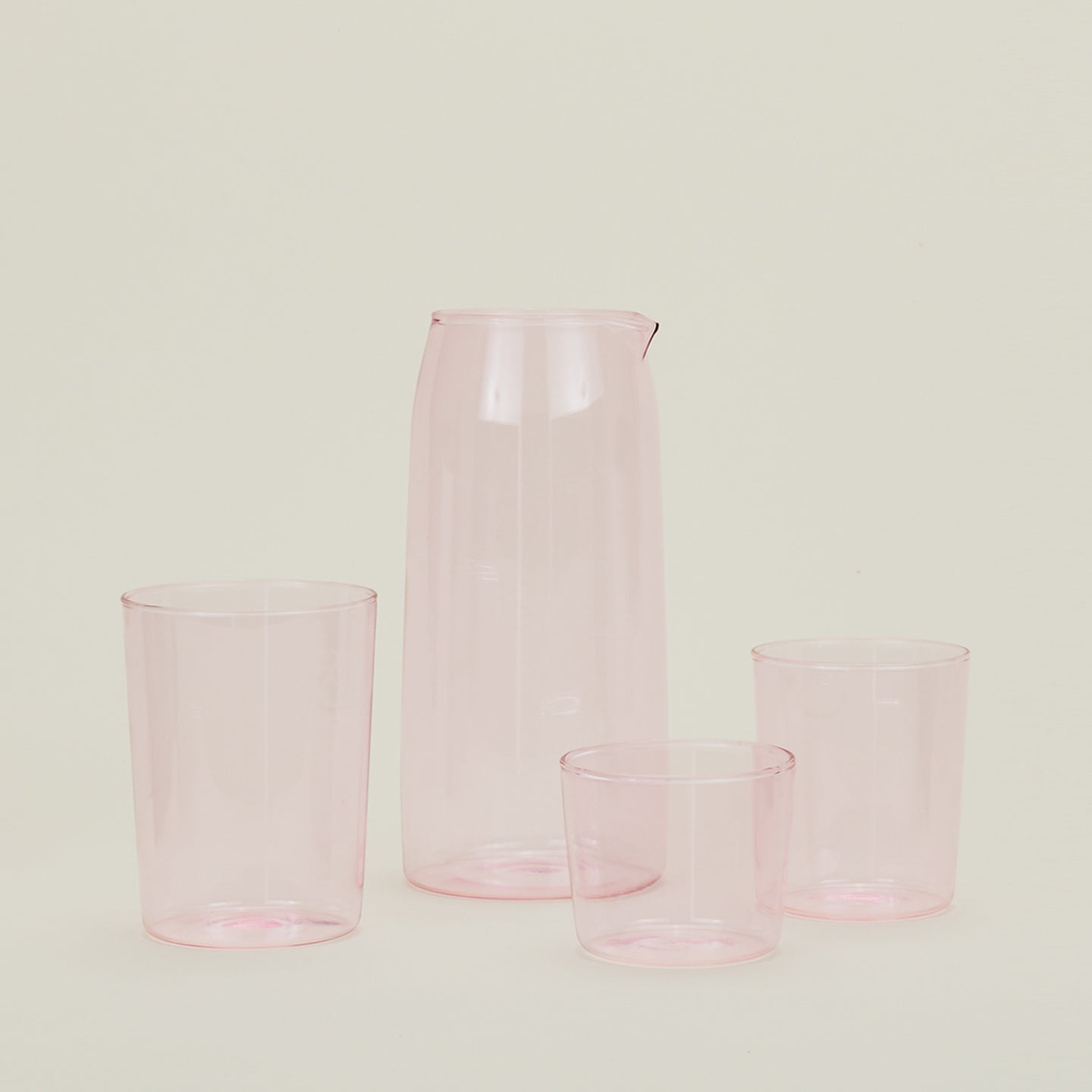 Small, Medium and Large Essential Glasses with Essential Glassware Pitcher in Blush.
