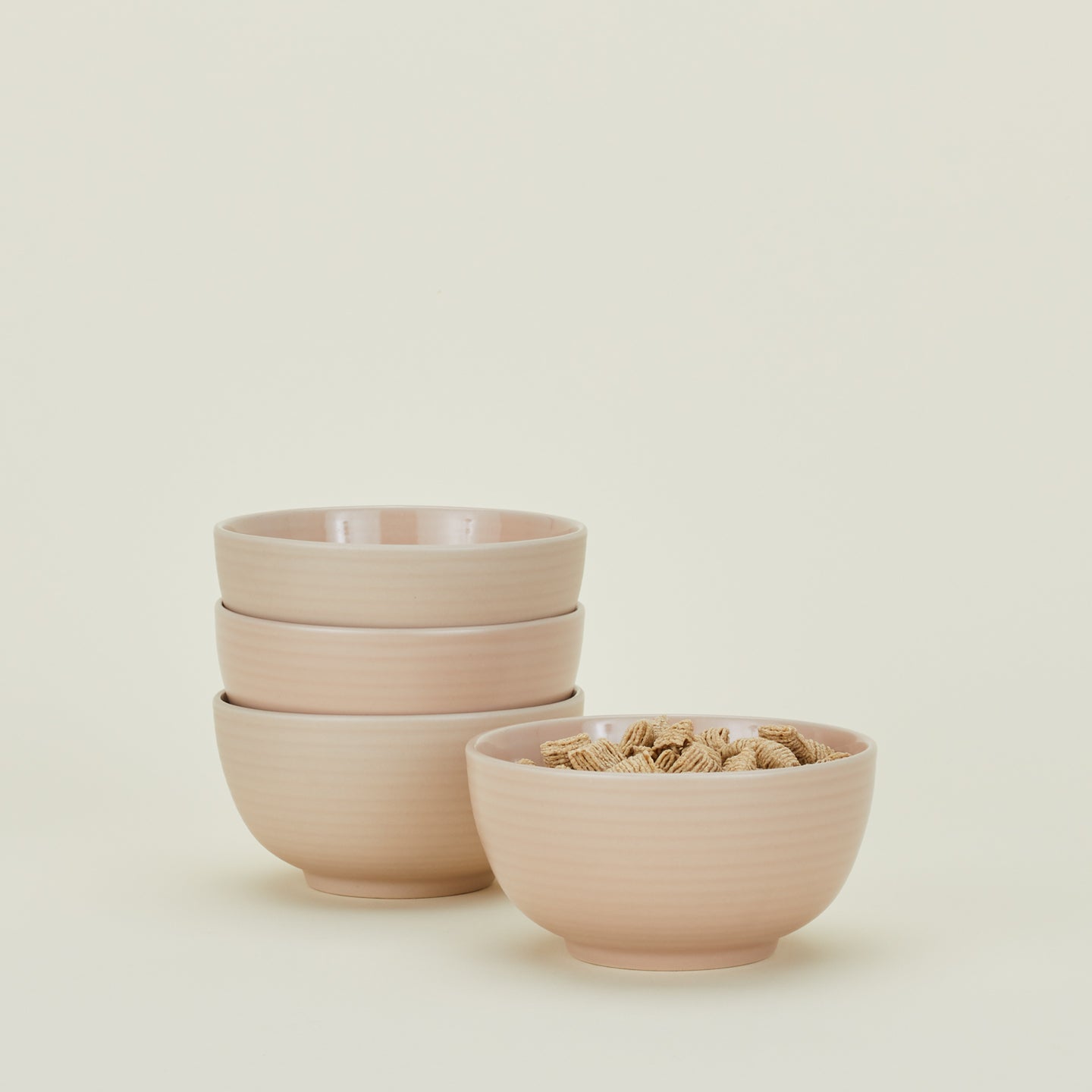 Four Essential Large Bowls in Blush, with cereal.