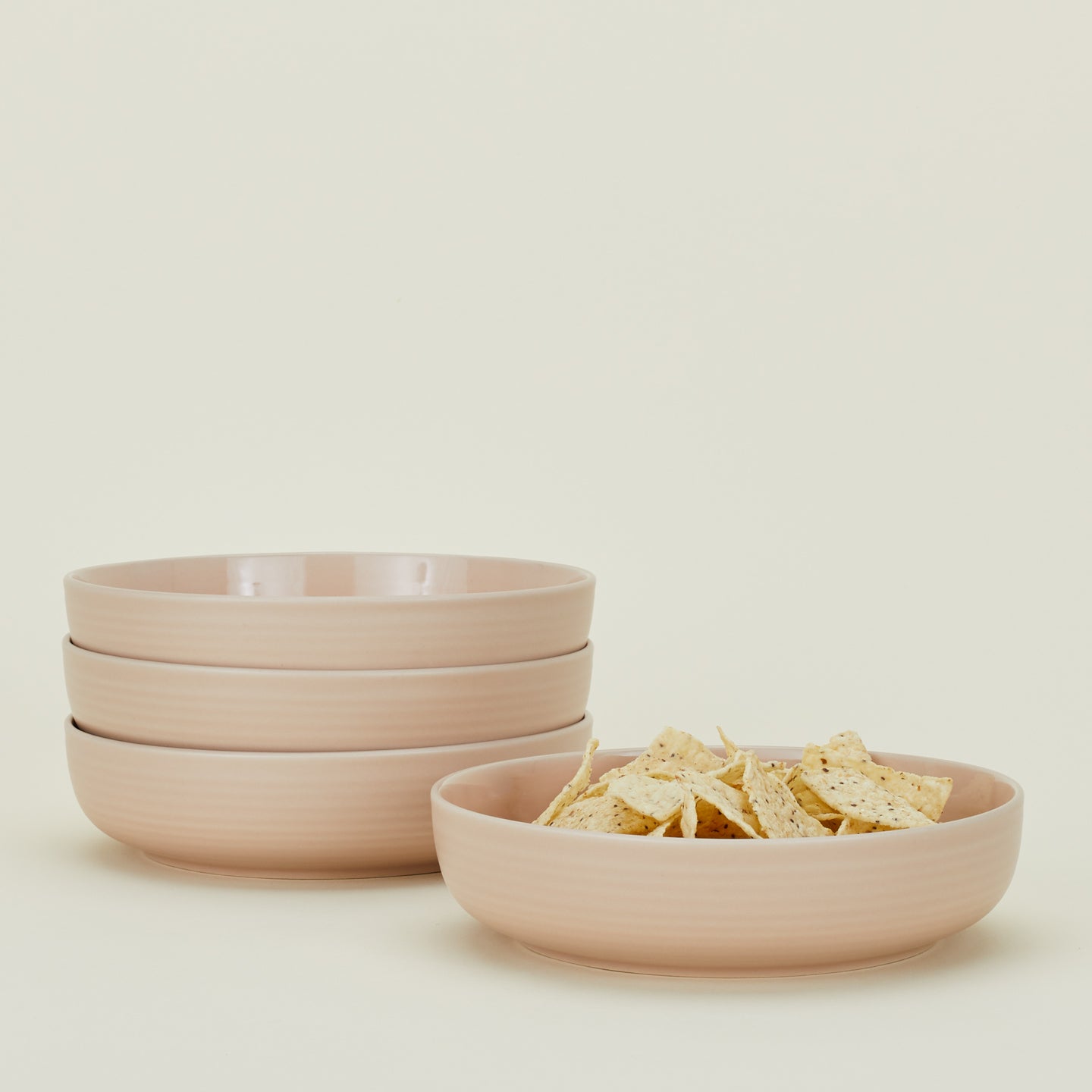 Four Essential Low Bowls in Sky, with tortilla chips.