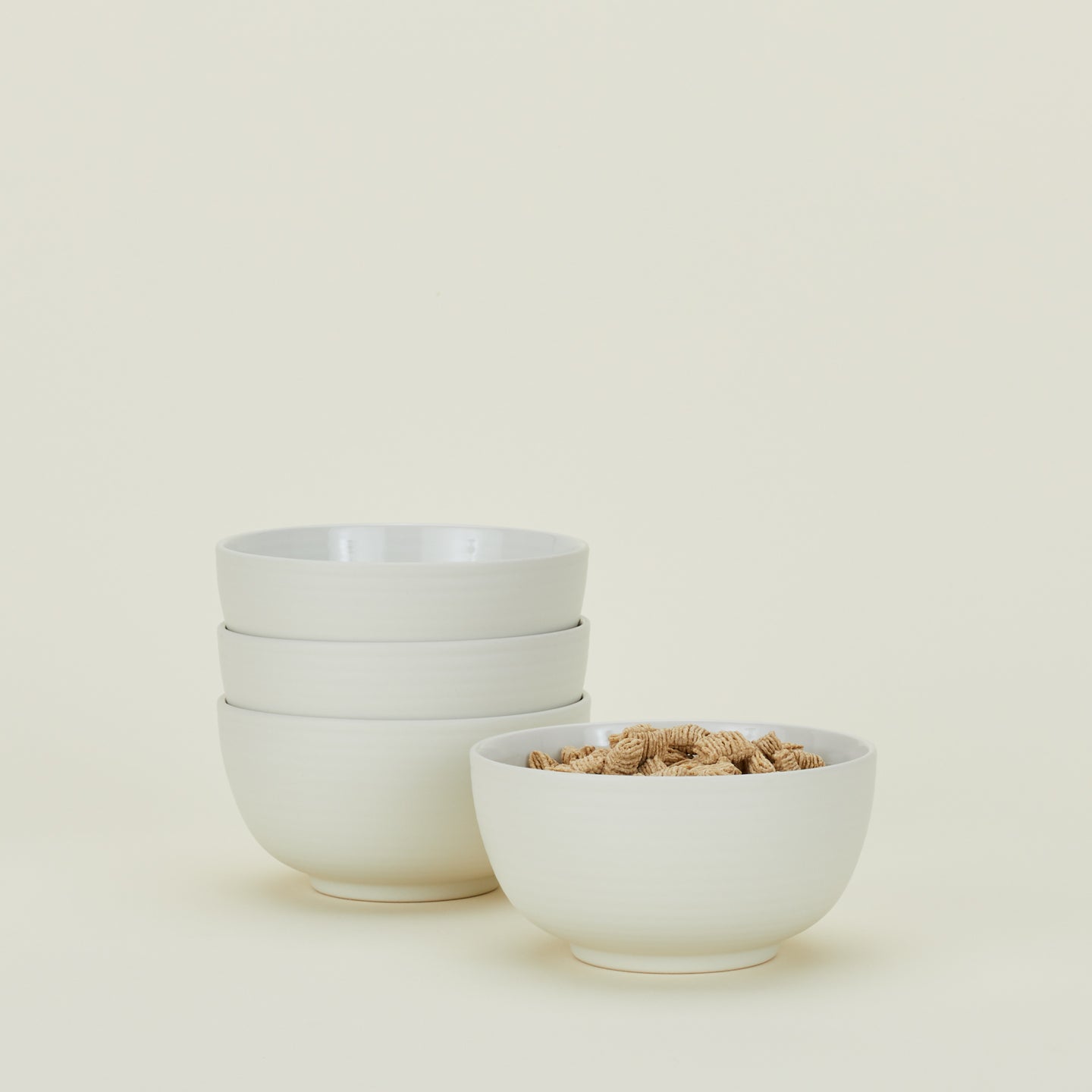 Four Essential Large Bowls in Bone, with cereal.