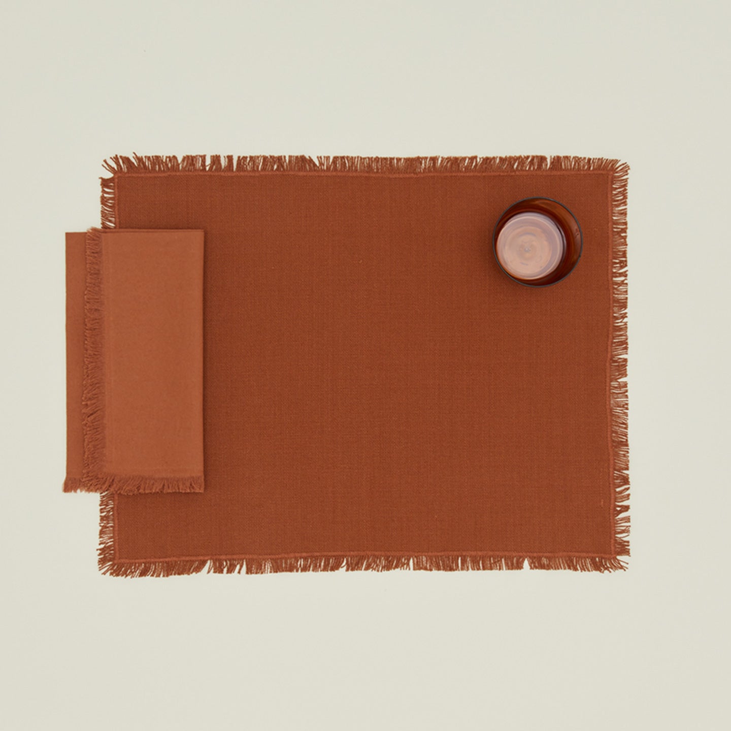 Essential Dinner Napkins in Terracotta with Placemat.