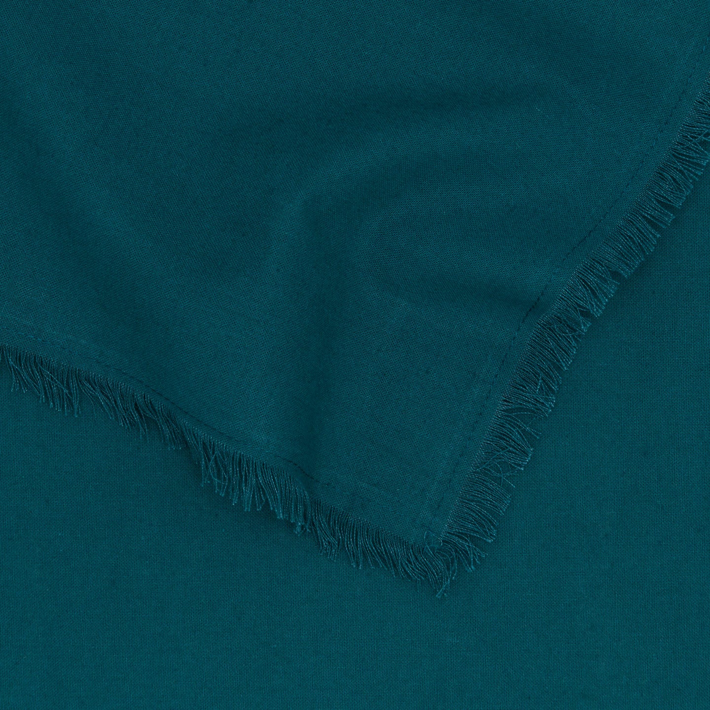 Close up of Essential cotton tablecloth in Peacock.