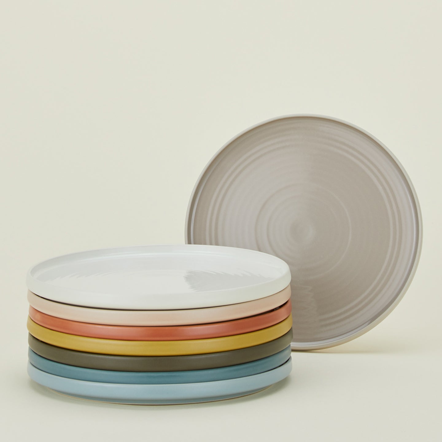 Group of Essential Dinner Plates in various colors.