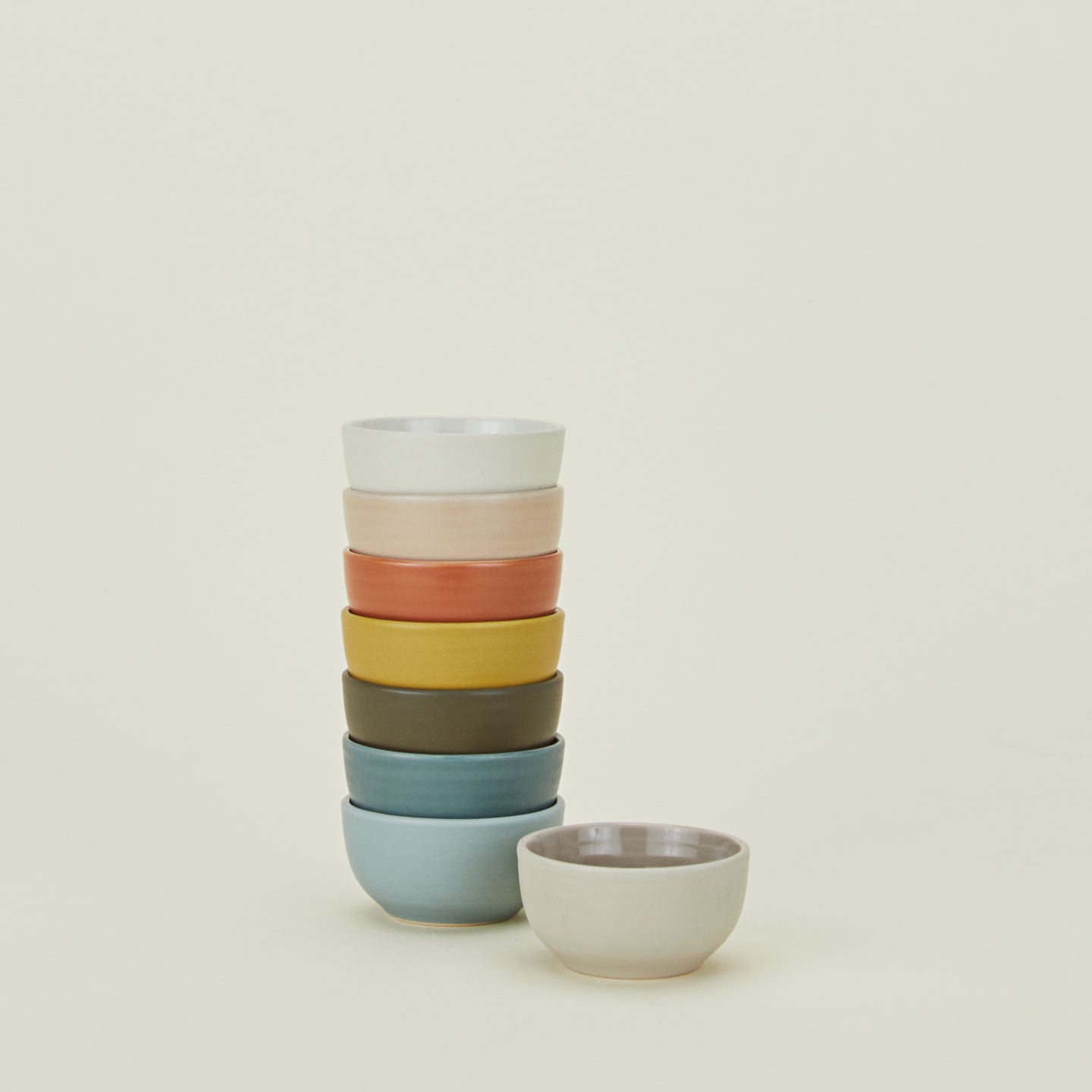 Stack of Essential Extra Small Bowls in various colors.