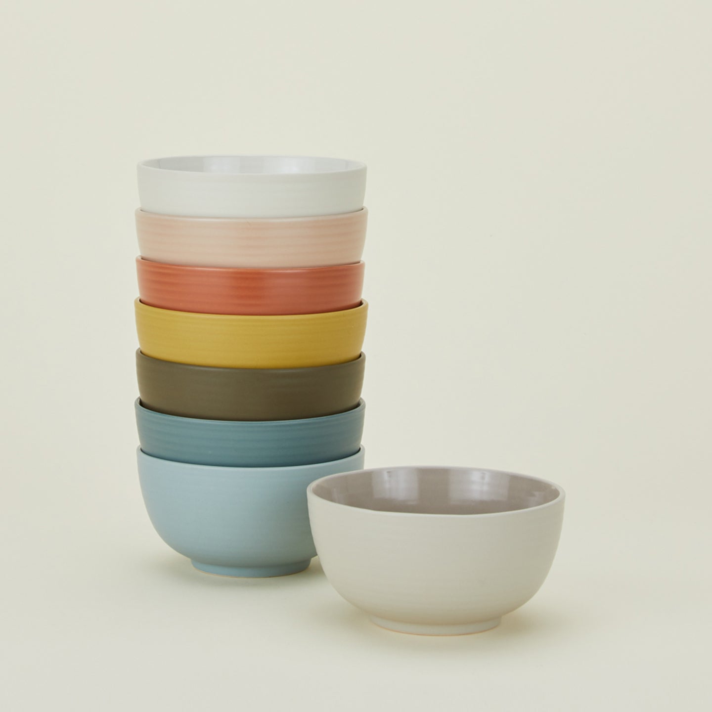 Stack of Essential Large Bowls in various colors.