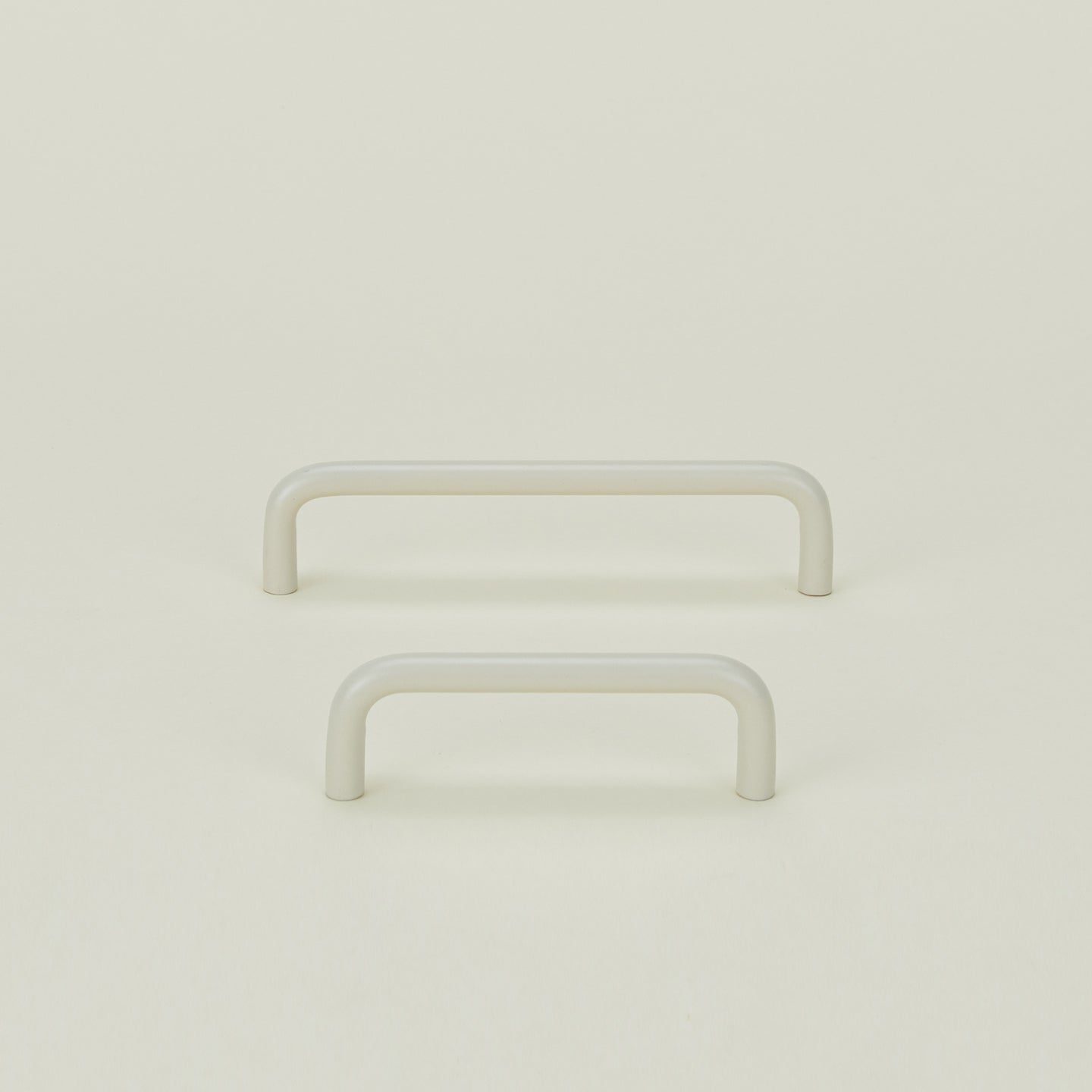 Small and large drawer pulls in Ivory.