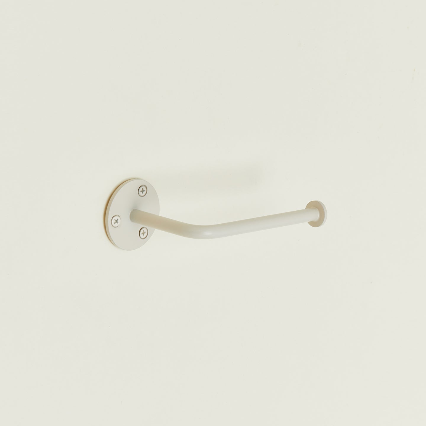 Toilet paper holder in Ivory.