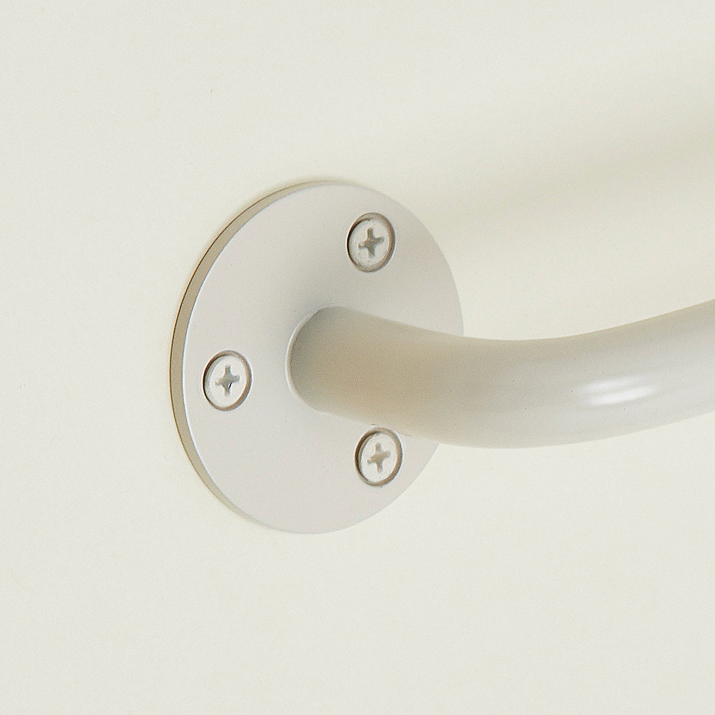 Close up of towel bar in Ivory.