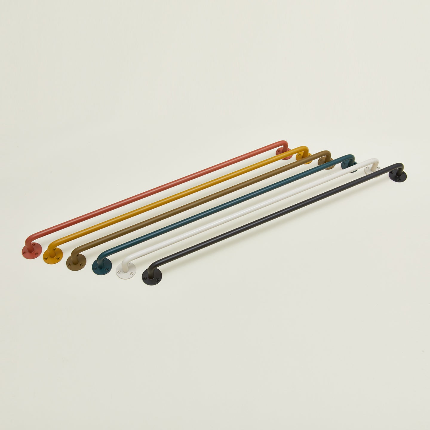 Large towel bars in a variety of colors. 