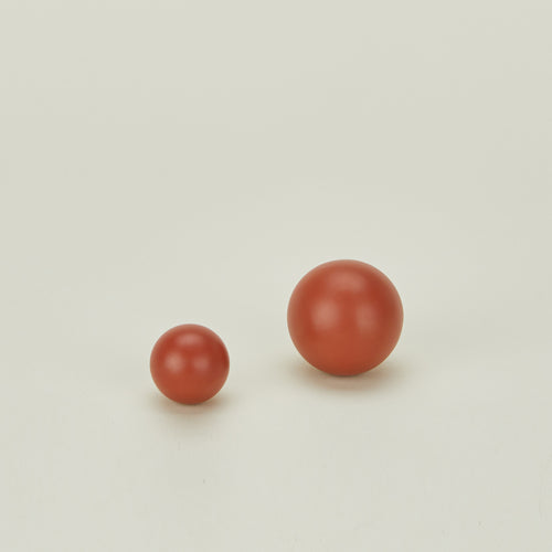 Small and large sphere knob in Terracotta.