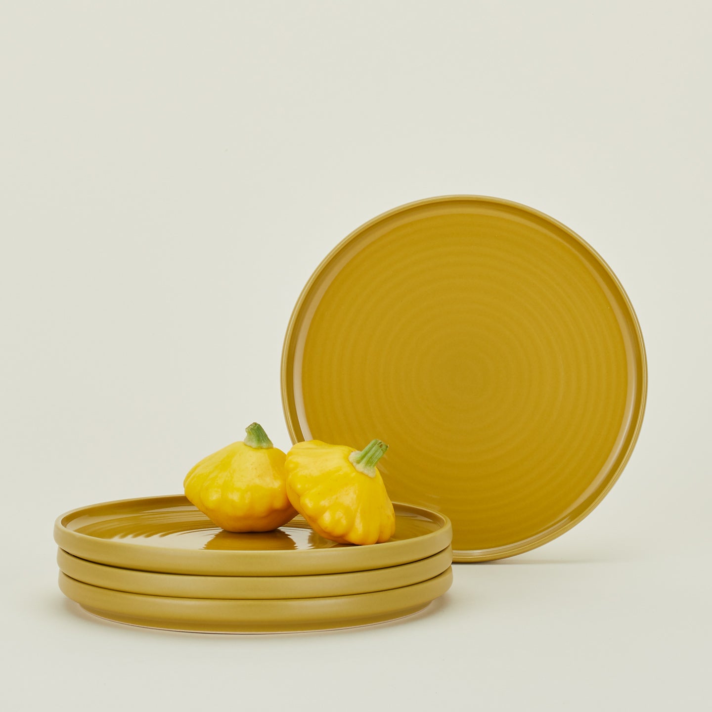 Four Essential Salad Plates in Mustard, with squash.