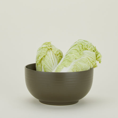 Essential Serving Bowl in Olive with cabbage.