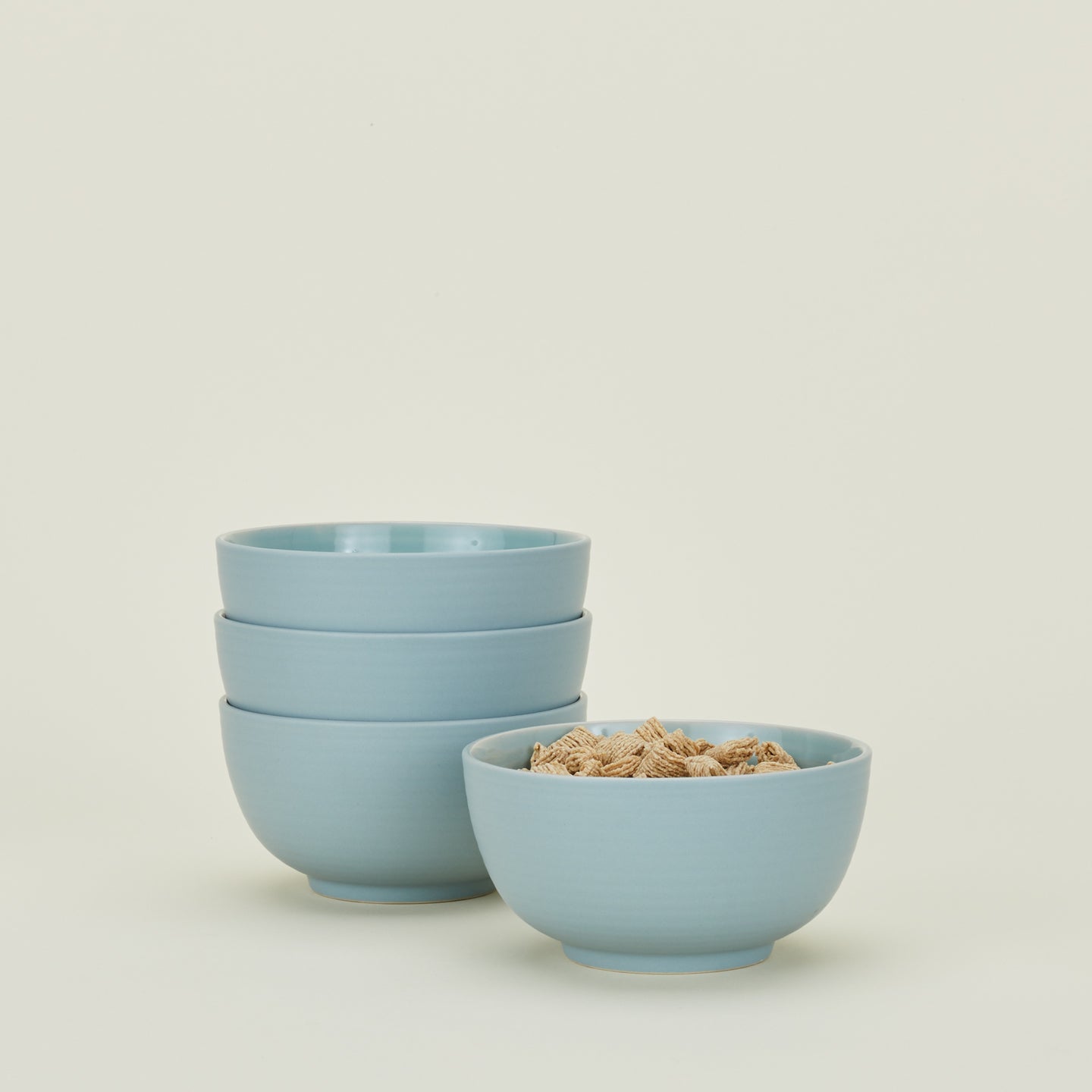 Four Essential Large Bowls in Sky, with cereal.