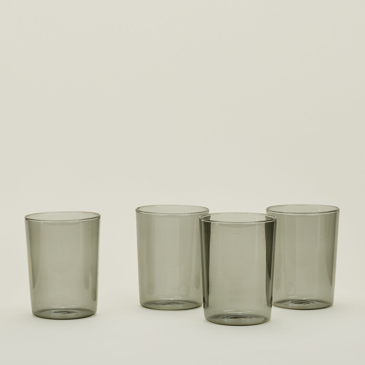 Four Large Essential Glasses in Smoke.