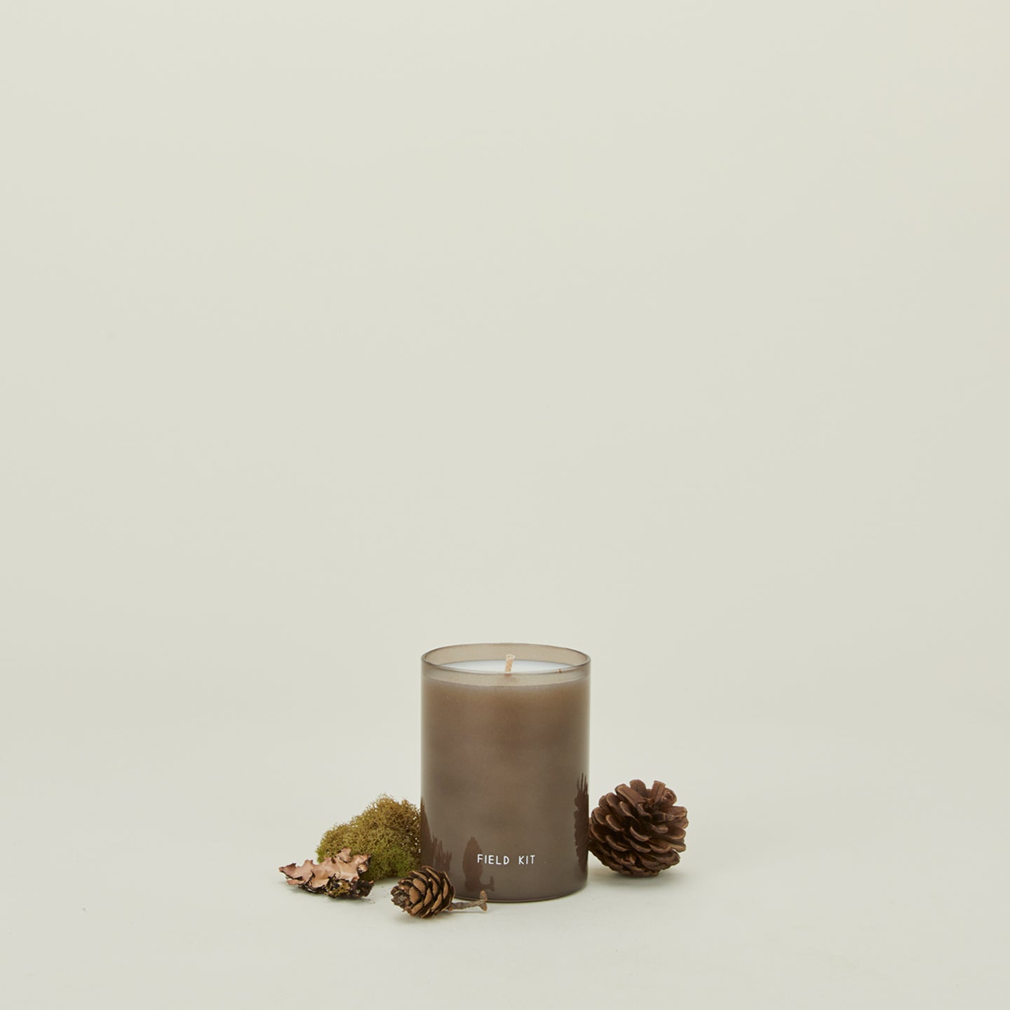 Field kit lumberjack candle with pinecones, moss, and bark 