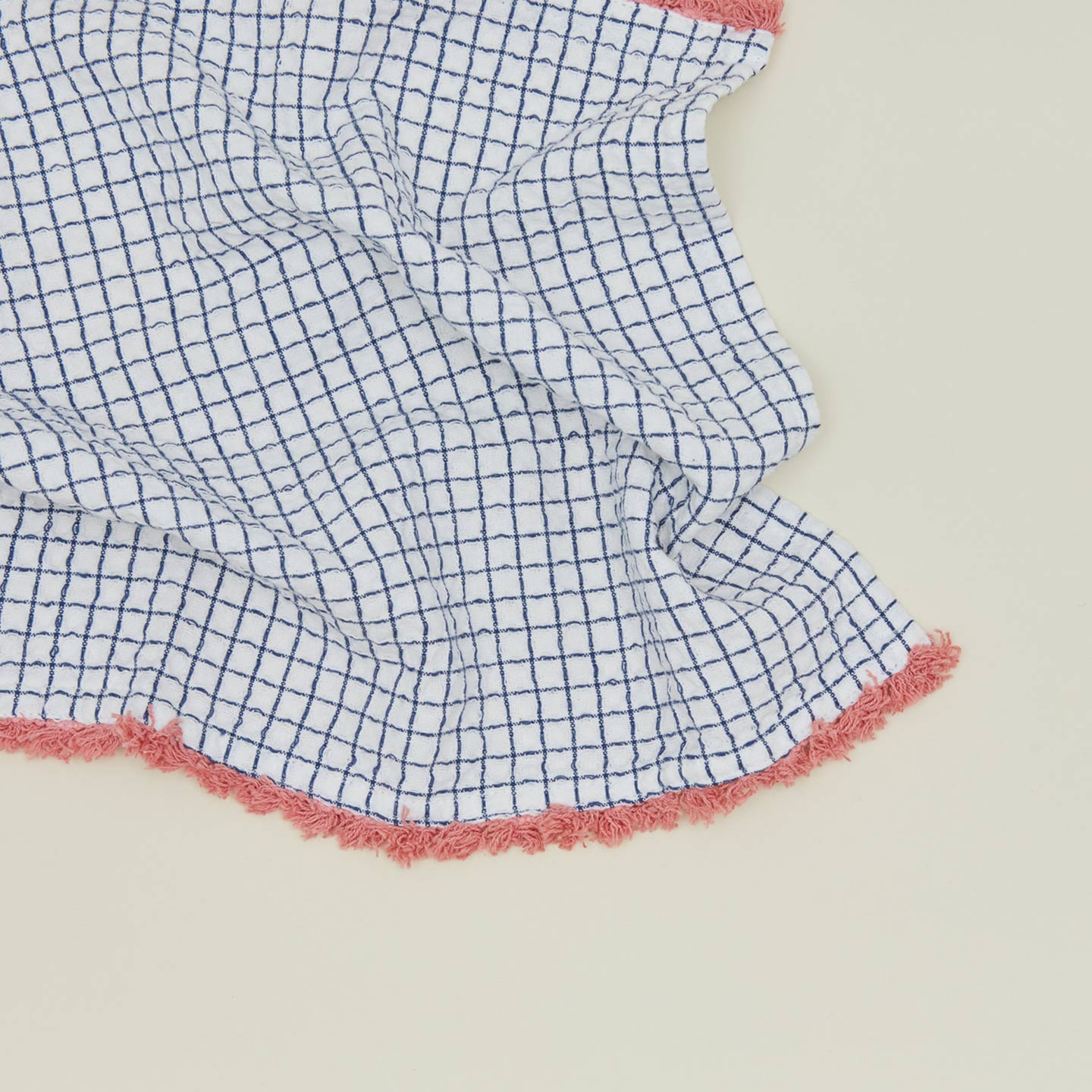 Detailed view of Fort + Field fringe dishcloth