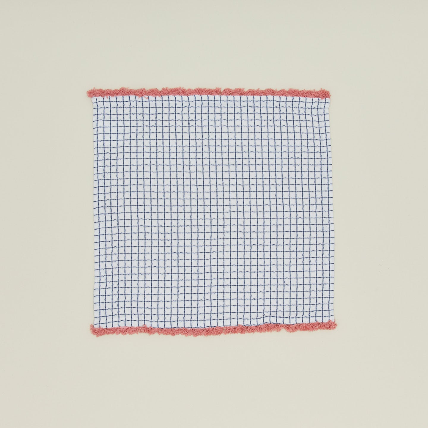 Fort + Field fringe dishcloth lain out flat