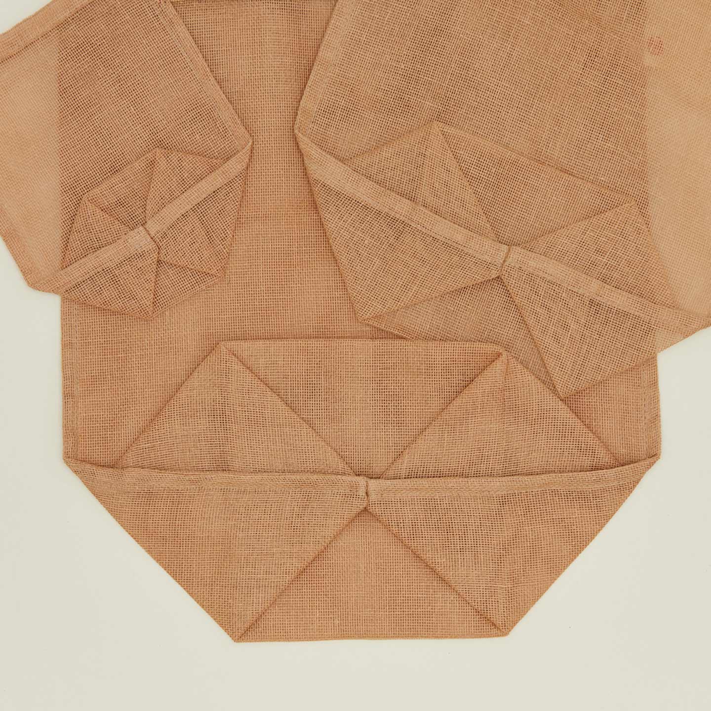 Detailed view of Fort + Field eco produce bags in tan