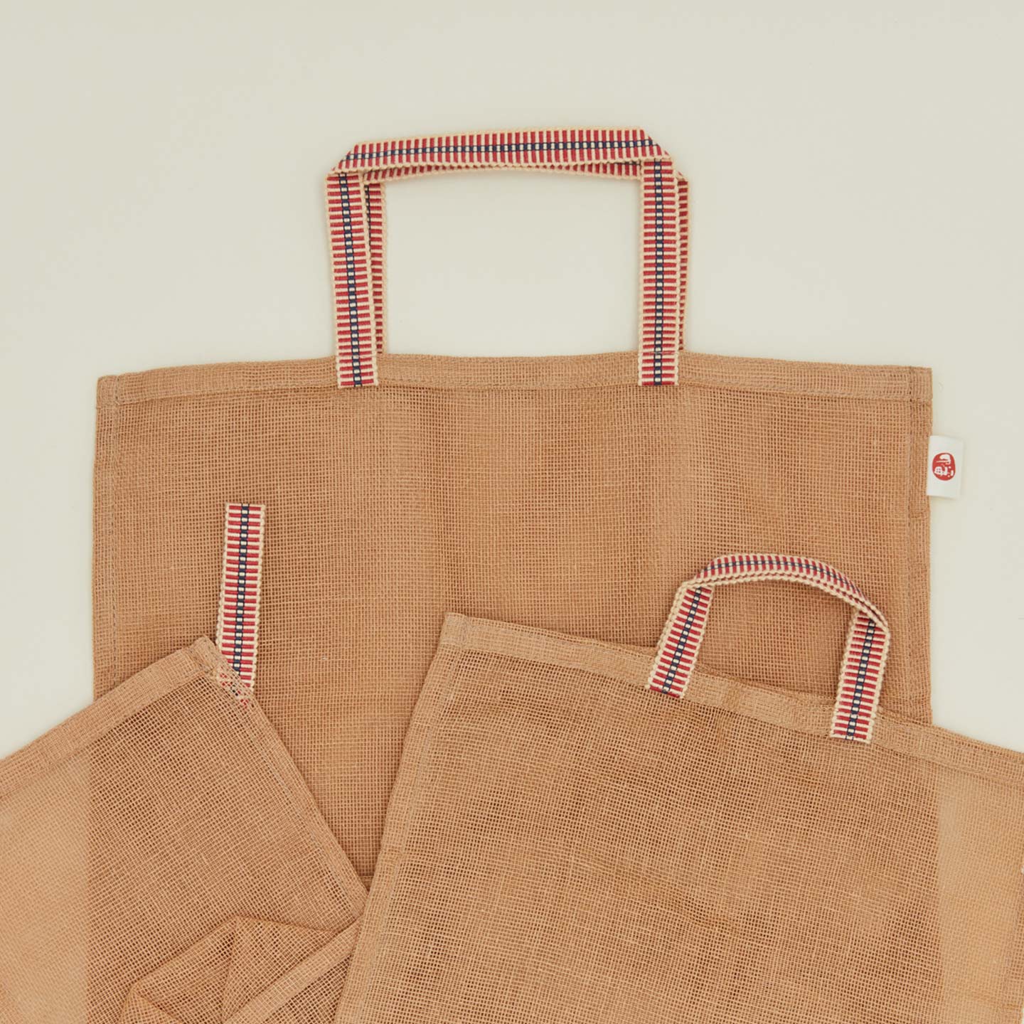 Detailed view of Fort + Field eco produce bags in tan