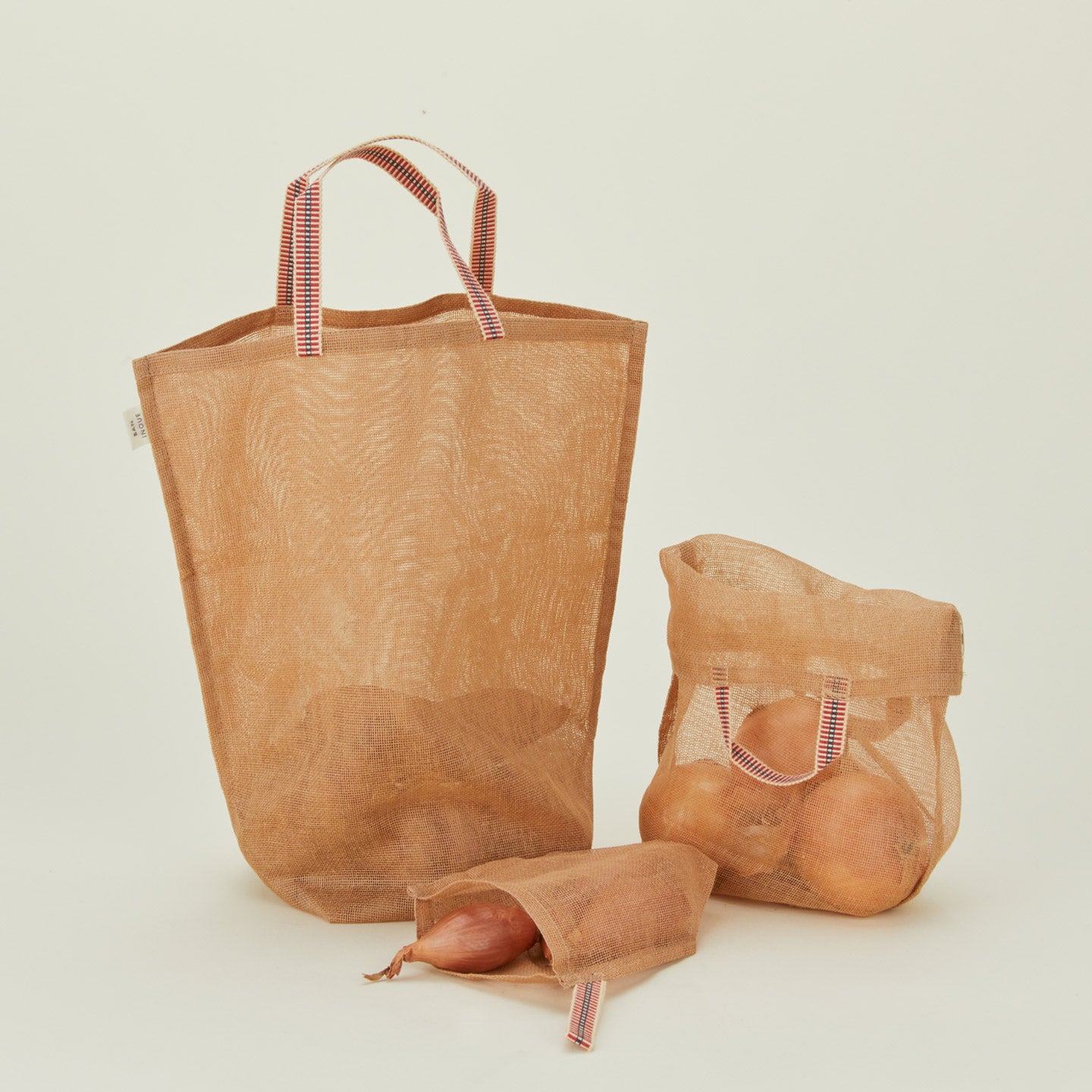 Fort + Field eco produce bags in tan with various vegetables