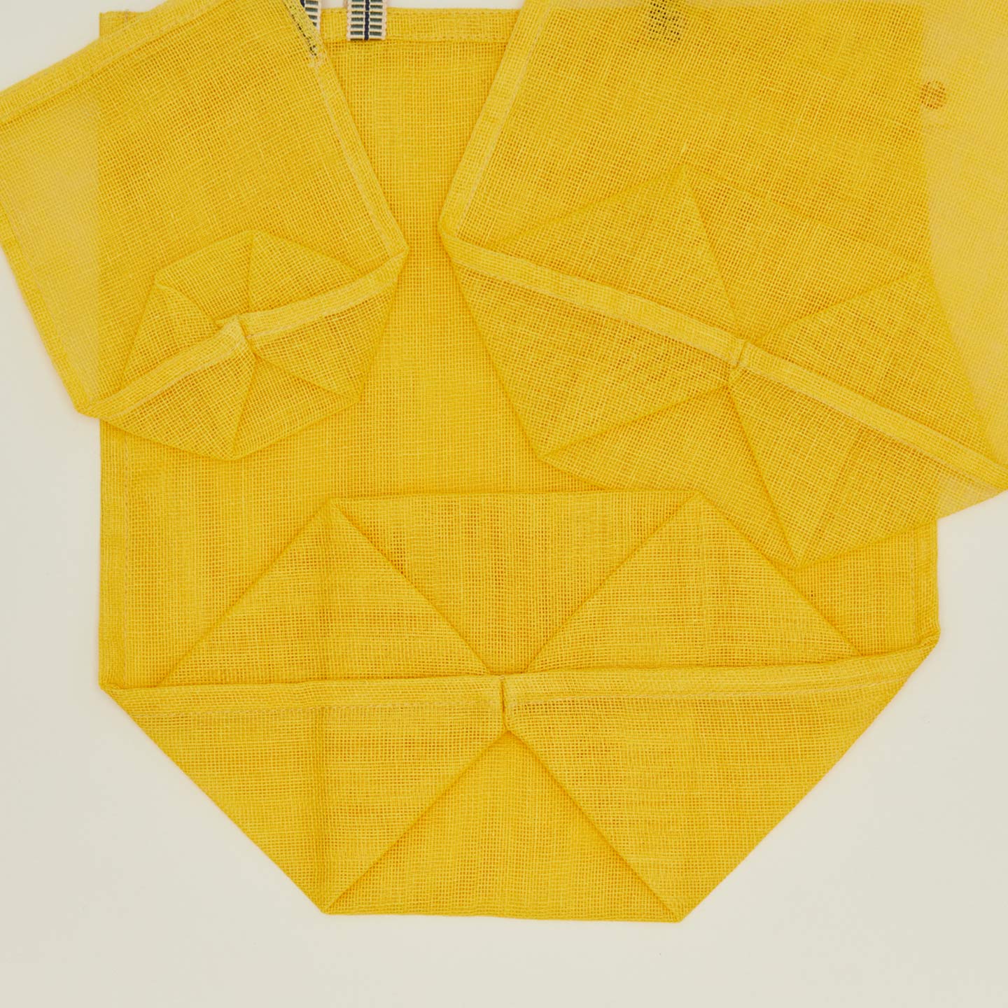 Detailed view of Fort + Field eco produce bags in yellow