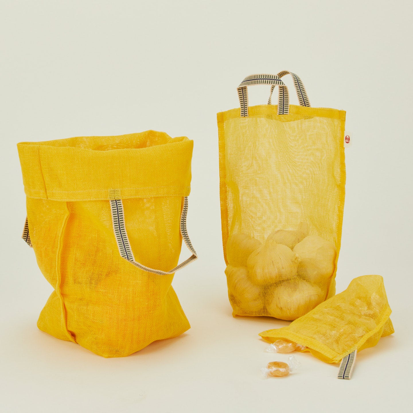 Fort + Field eco produce bags in yellow with garlic and candies