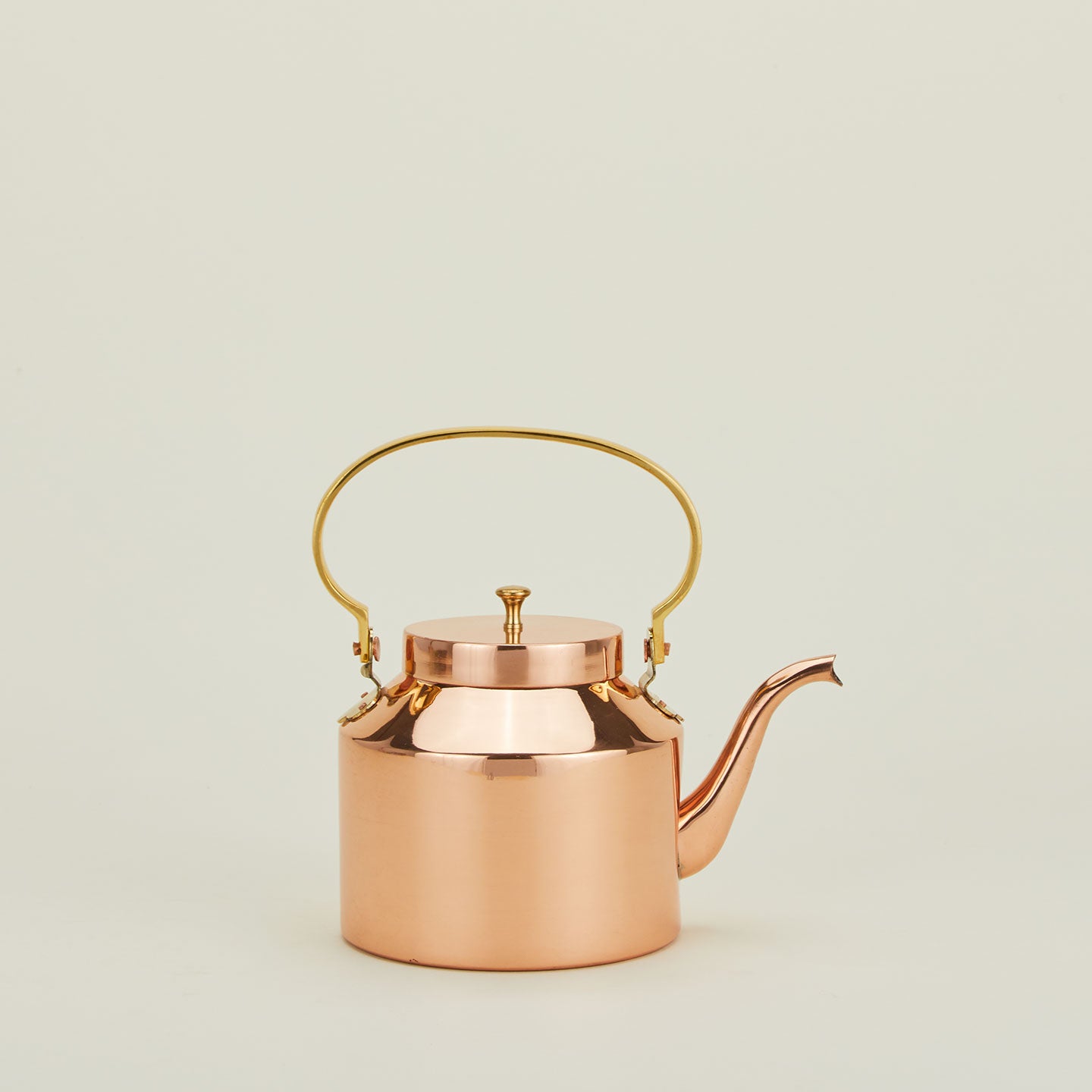 English copper tea kettle with brass handle.