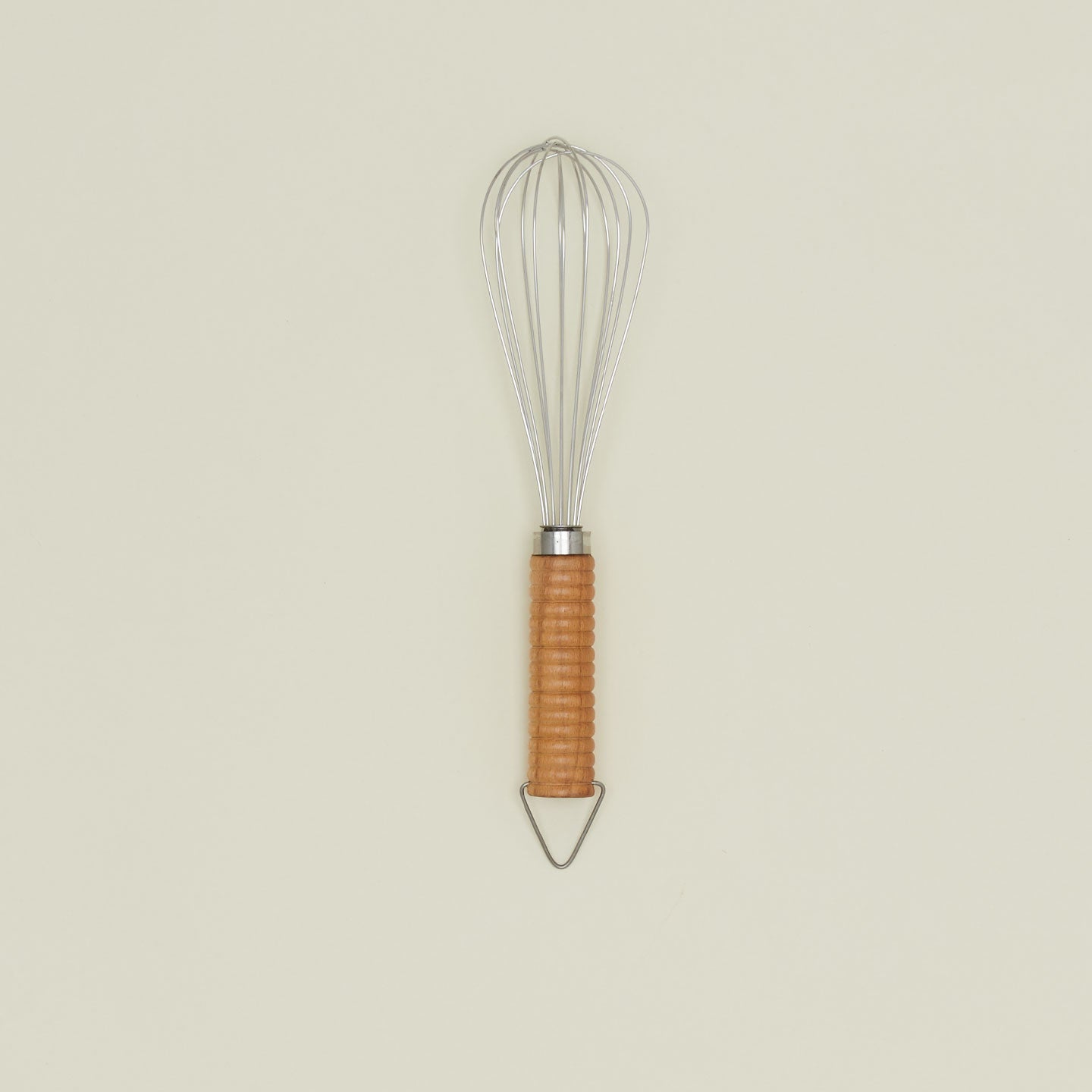 Stainless steel whisk with wooden handle.