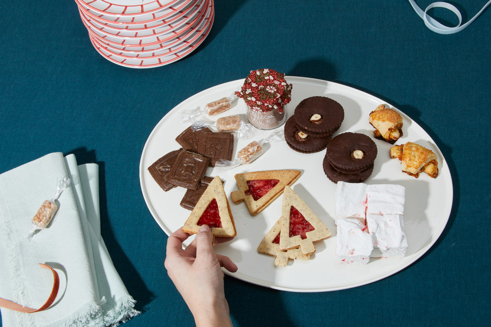 Holiday cookies on a porcelain serving platter. 