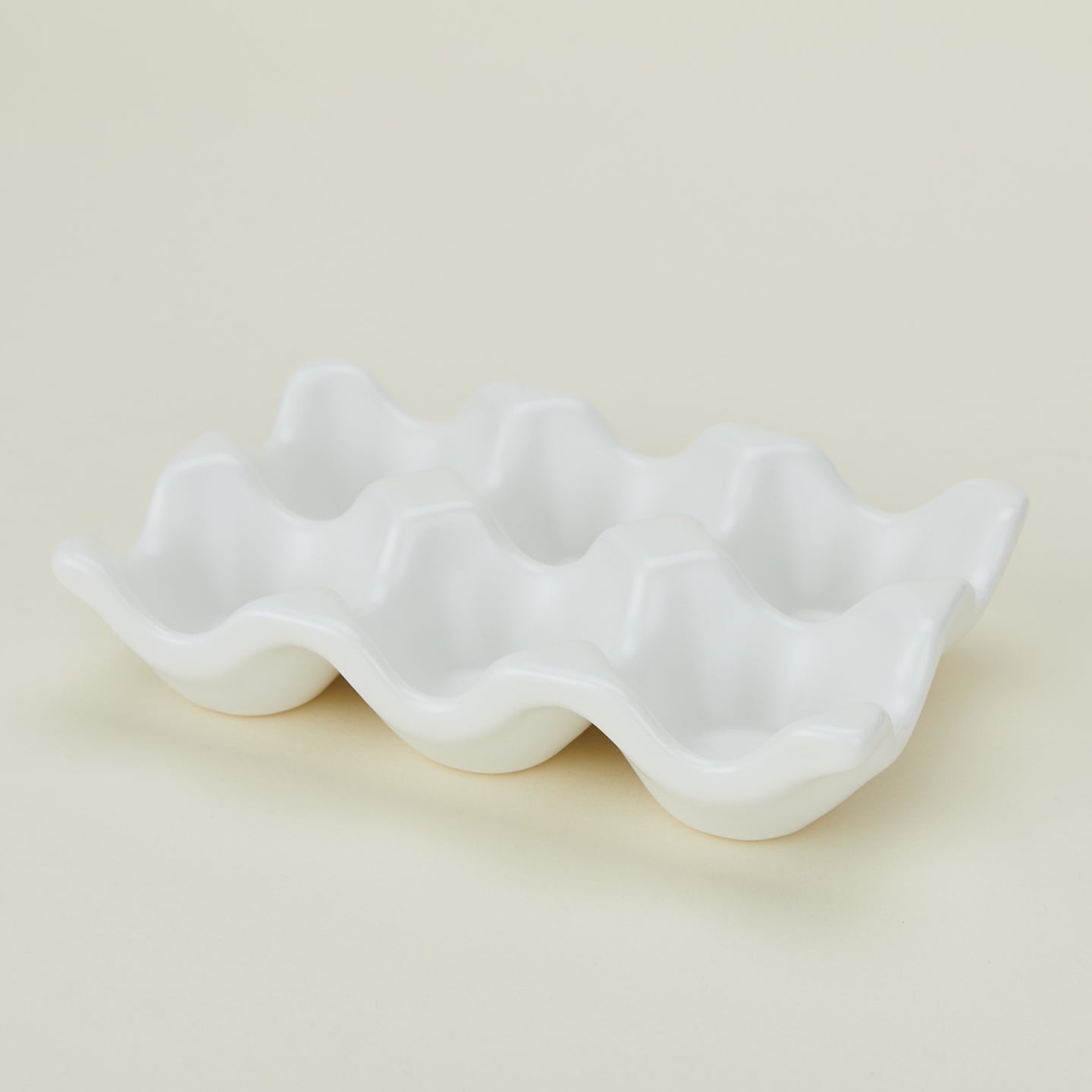 Ceramic half dozen egg holder in white