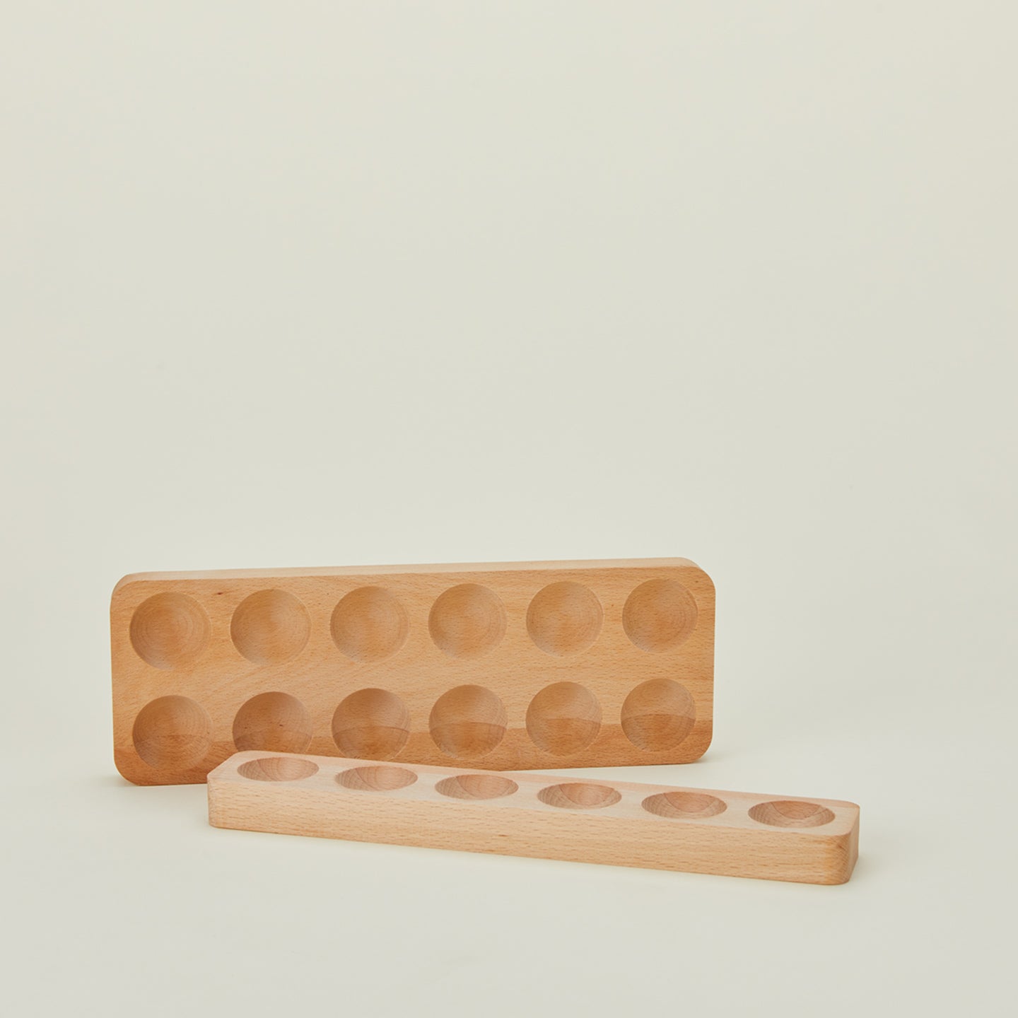 Wooden egg holders in half and dozen sizes