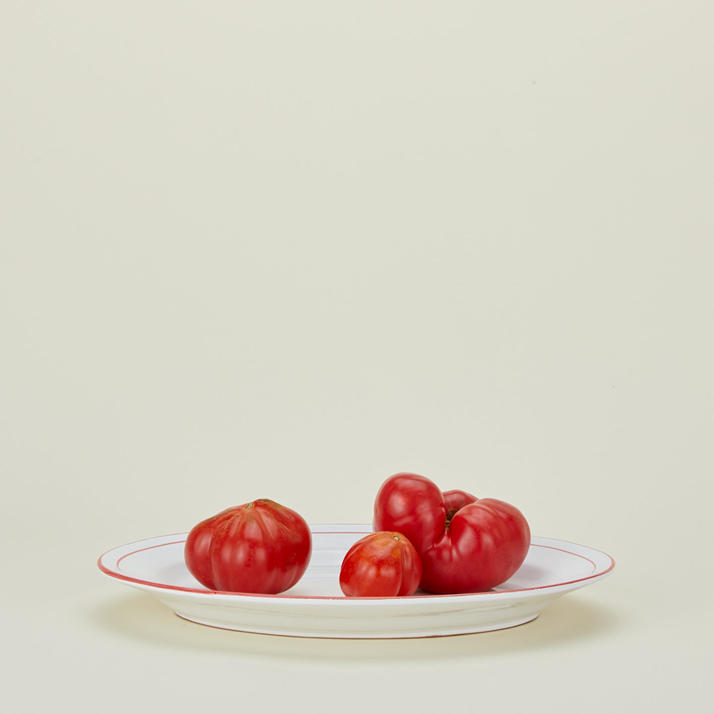 Jore Copenhagen large rimmed oval platter with tomatoes