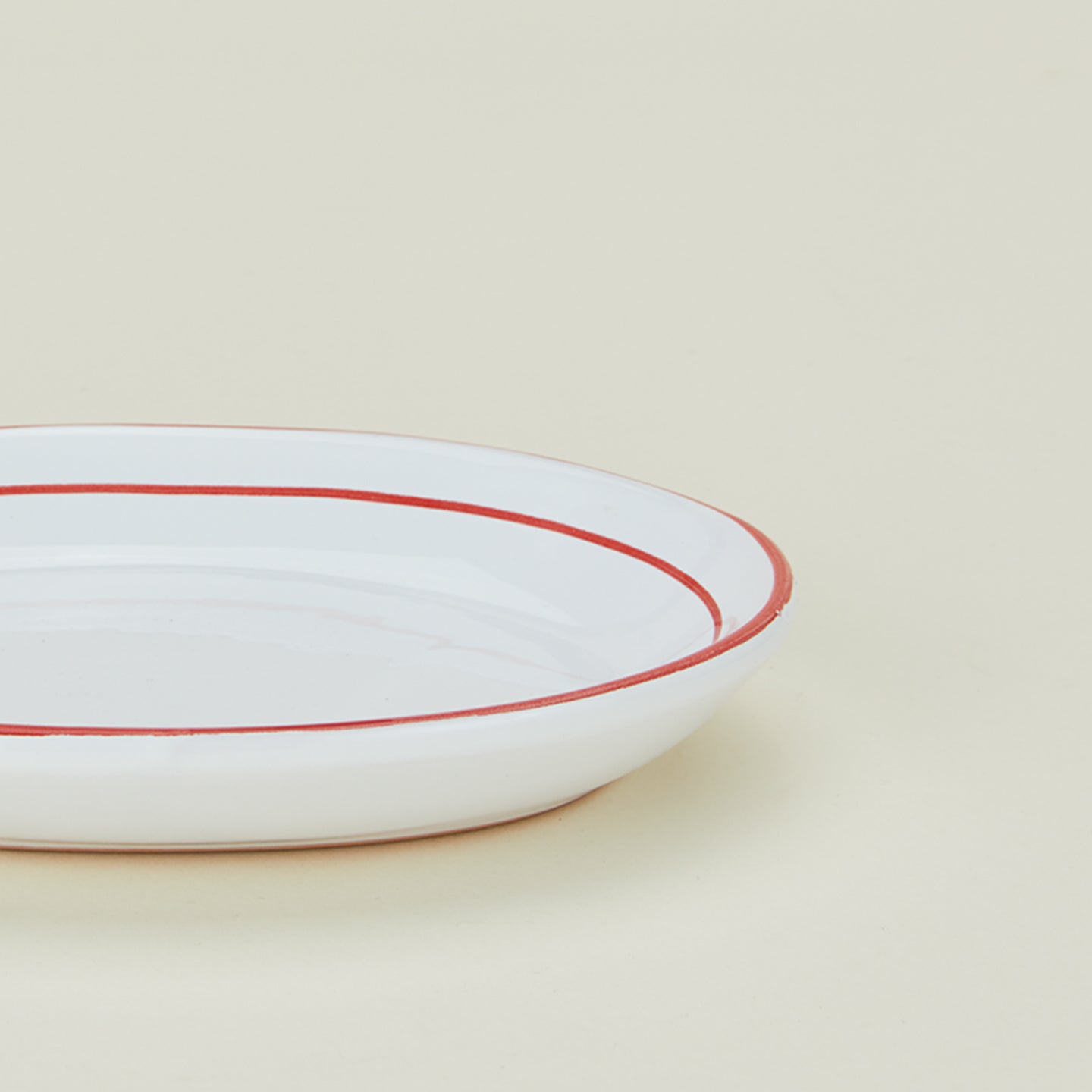 Close up of small oval rimmed platter 