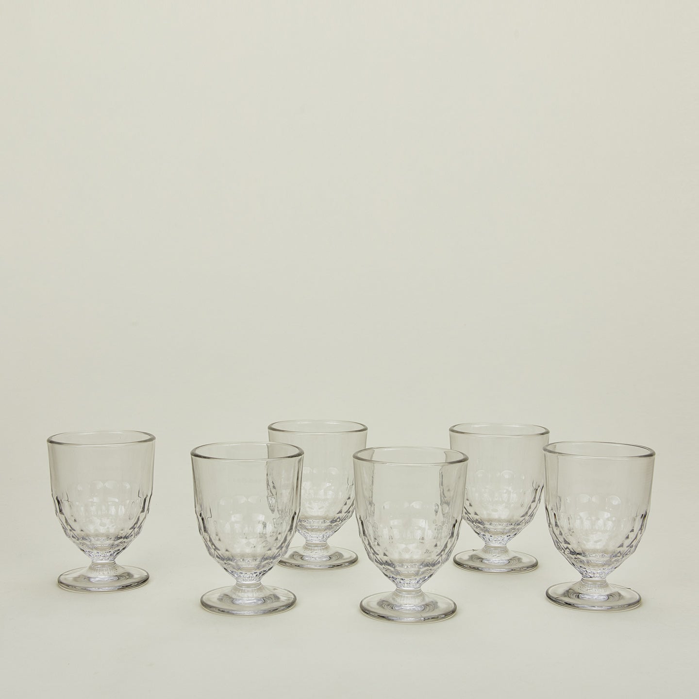 Six Artois wine glasses.